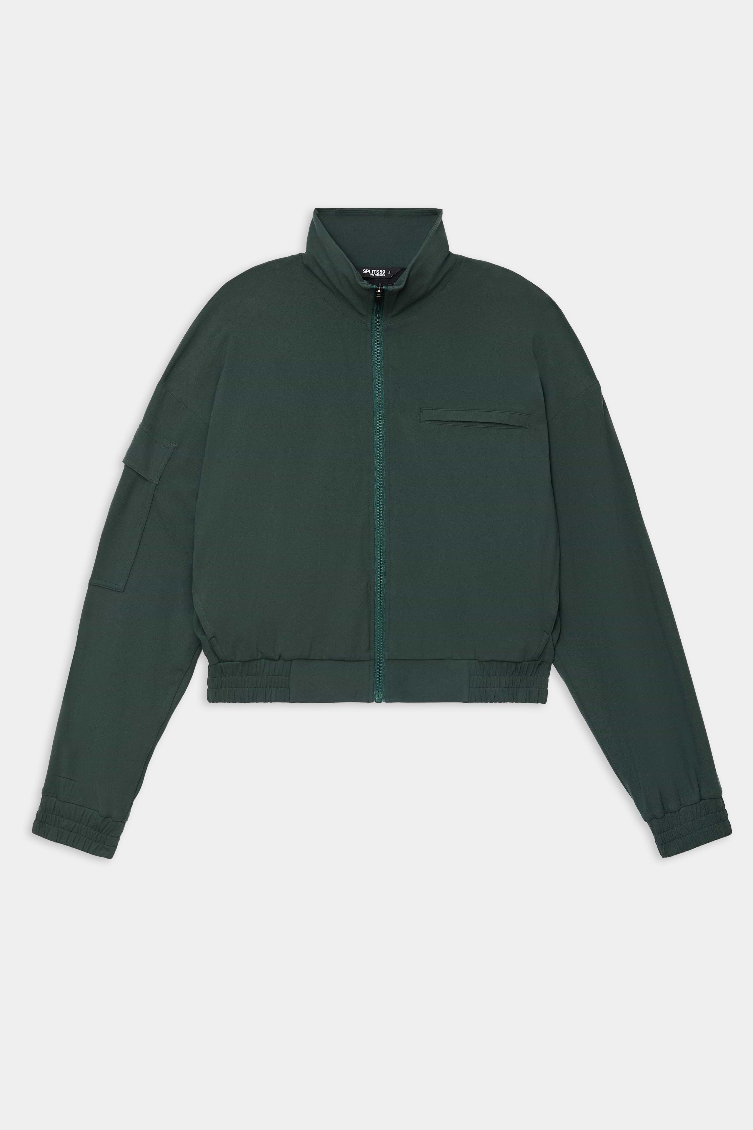 The SPLITS59 Peaches Airweight Cargo Jacket - Military is a dark green cropped nylon spandex jacket with a front zipper, high collar, chest pocket, and elastic cuffs and hem, shown on a white background.