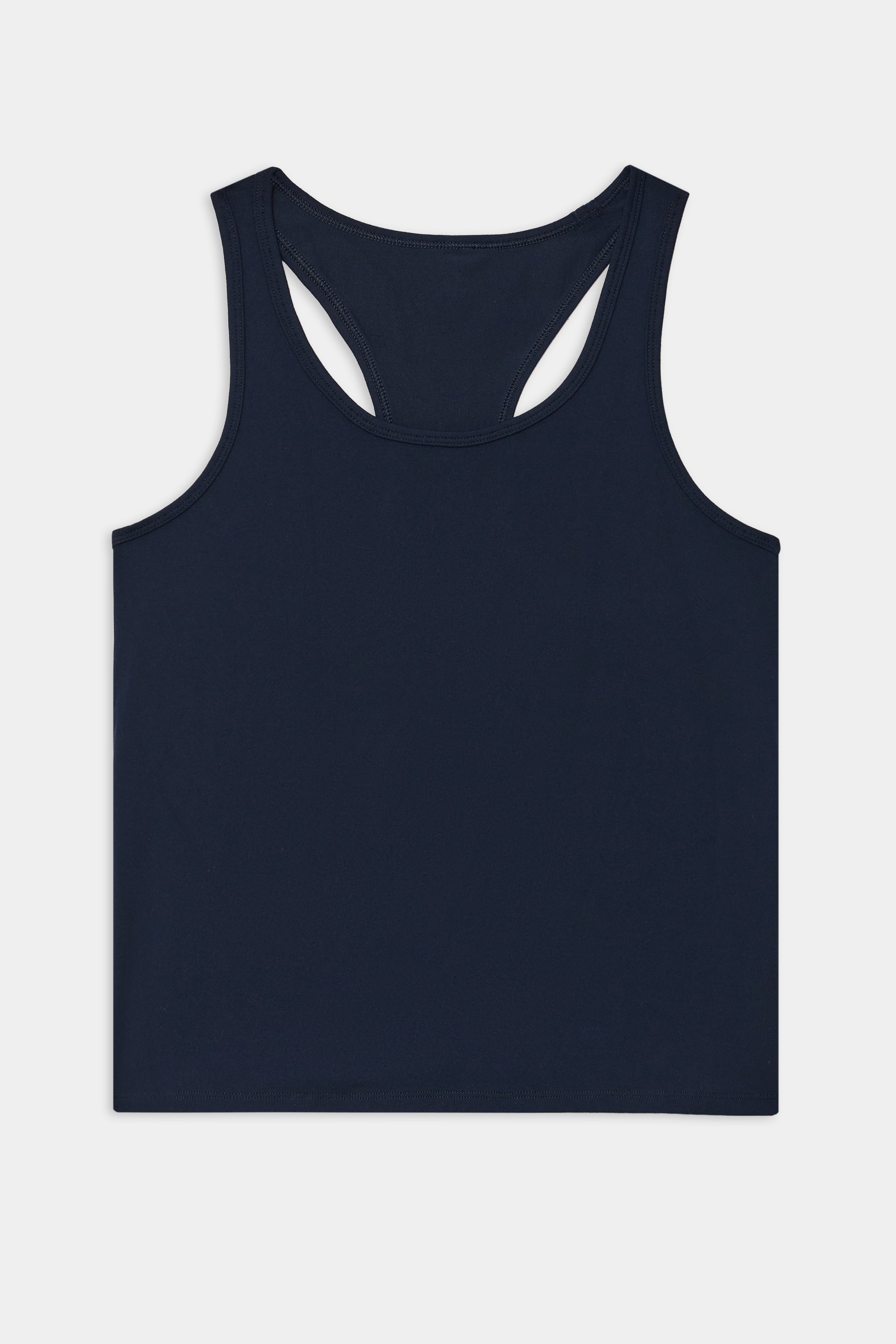 The SPLITS59 Mel Airweight Lite Tank in indigo, a racerback style, is displayed flat against a white background.