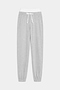 The SPLITS59 Andie Dual Waist Sweatpant in Heather Grey/White features a soft modal spandex blend, white elastic waistband, white drawstring, and elastic cuffs, shown laid flat on a plain background.