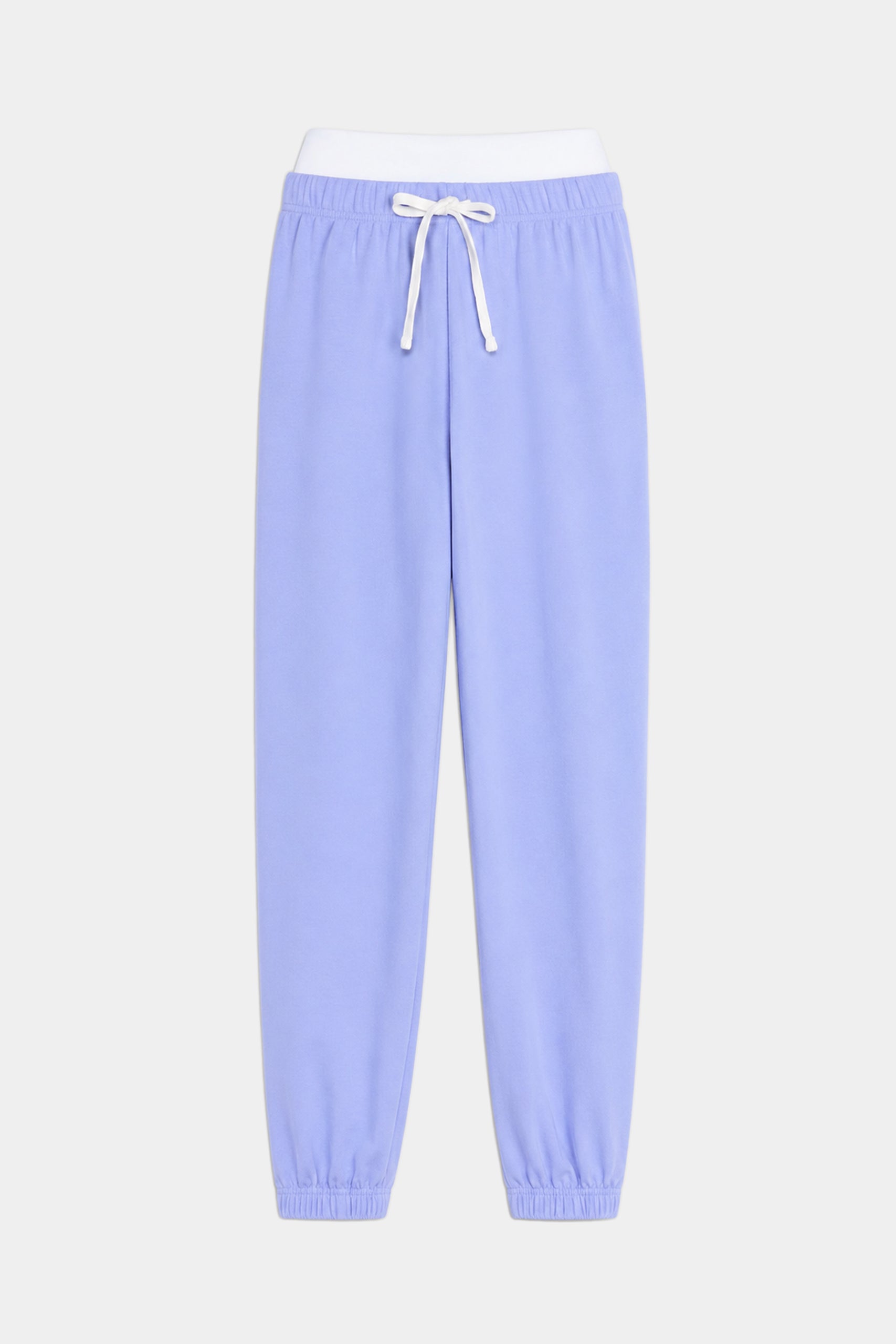 The SPLITS59 Andie Dual Waist Sweatpant in Purple Haze/White features soft modal fabric, a white drawstring, elastic waistband, and ankle cuffs, shown against a plain white background.