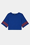The SPLITS59 Djuna Oversized Crop Jersey Tee - Cobalt/Terracotta is a blue, stretchy, short-sleeve crop top with red stripes on the sleeves, shown on a white background.