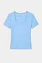 The SPLITS59 Ashby Rib Short Sleeve in Skylight, a light blue modal-spandex tee with rib texture and scoop neck, is shown laid flat on a white background.