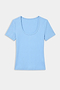 The SPLITS59 Ashby Rib Short Sleeve in Skylight, a light blue modal-spandex tee with rib texture and scoop neck, is shown laid flat on a white background.