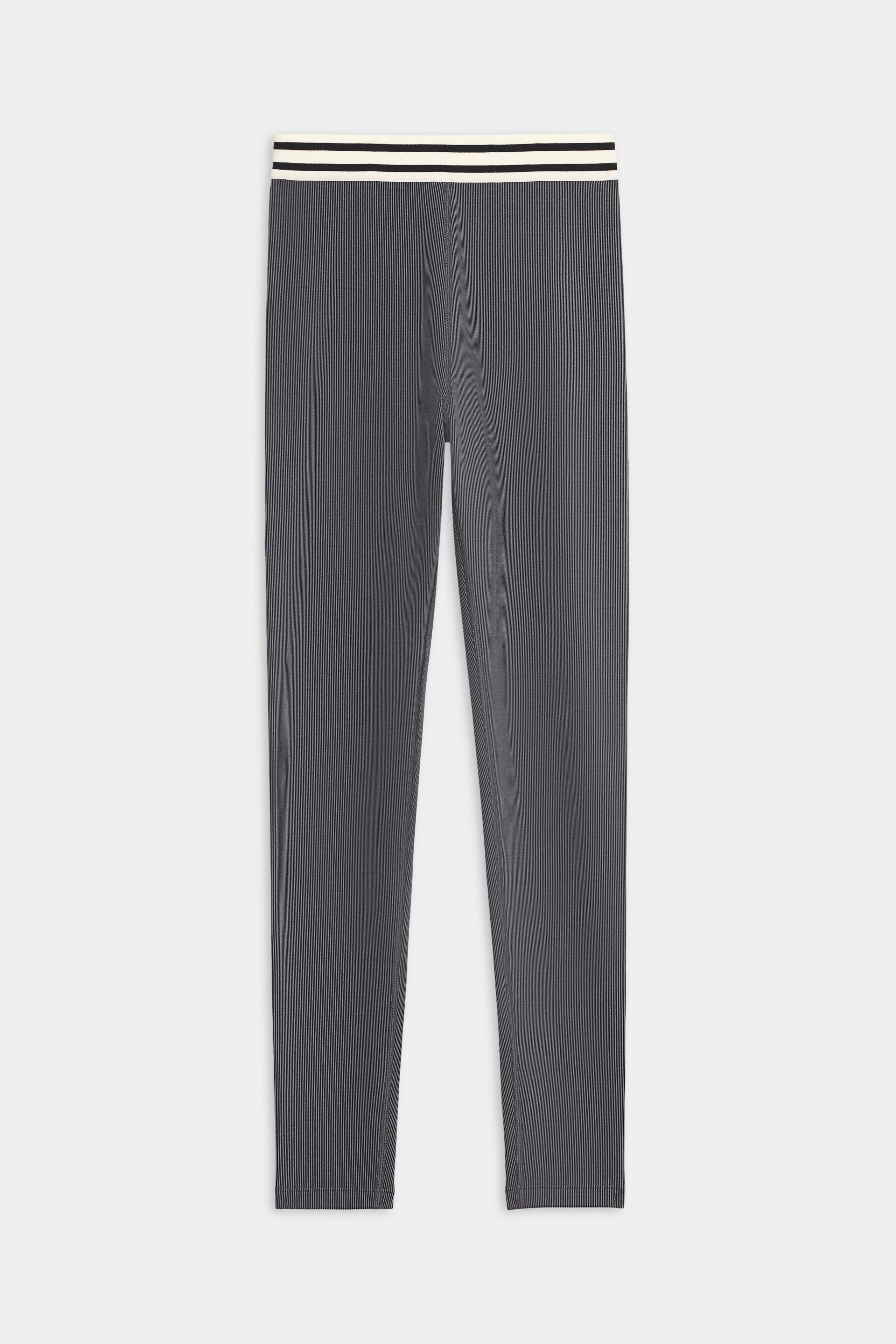 The SPLITS59 Bailey Active Rib High Waist 7/8 leggings feature a slim fit in gray with a white and black striped elastic waistband, shown flat against a white background.