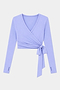 The SPLITS59 Bella Airweight Lite Wrap in Purple Haze features a V-neck, side tie, and long sleeves—perfect for Pilates or barre—shown against a plain white background.