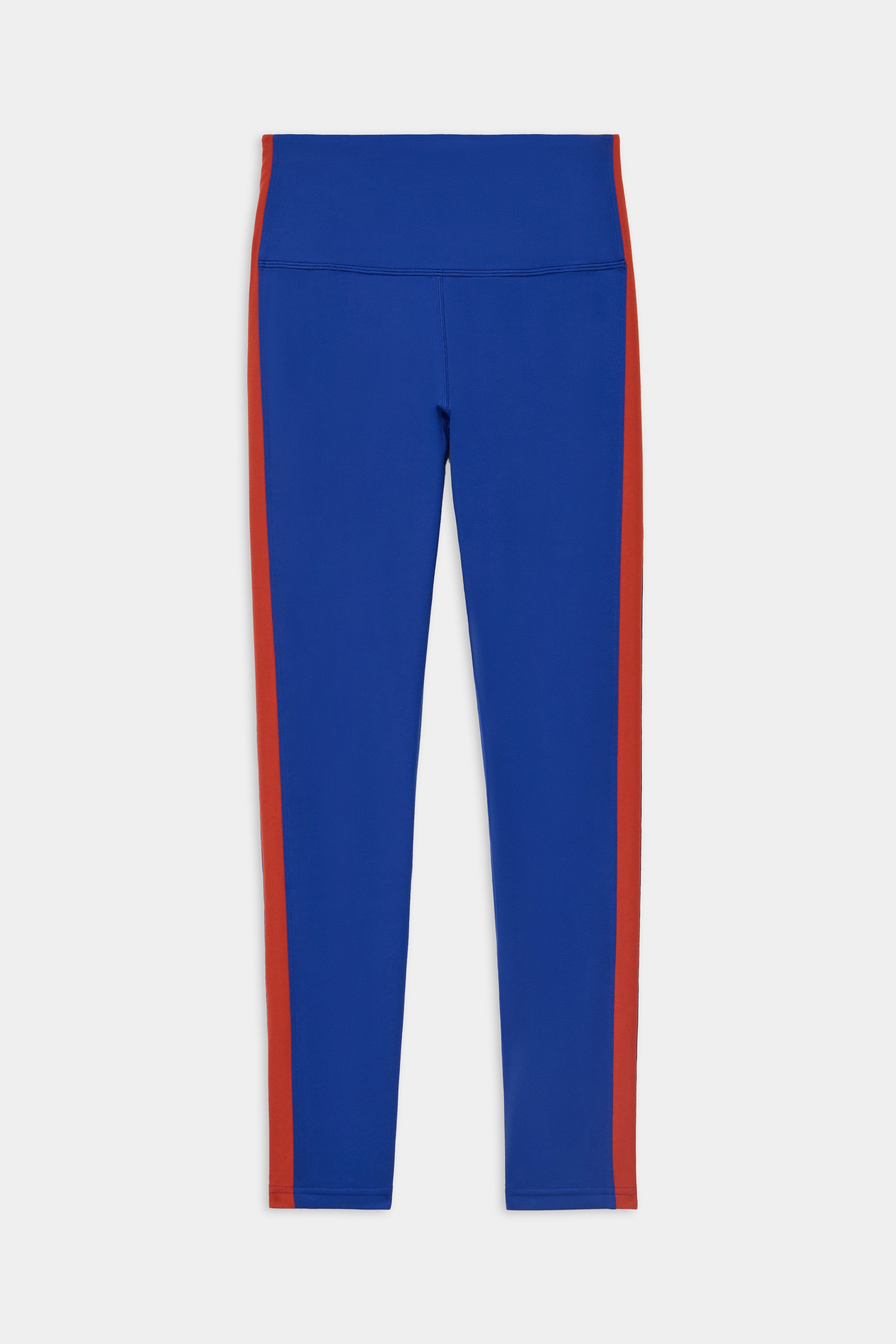 Clare High Waist Rigor 7/8 - Cobalt/Terracotta by SPLITS59 features blue leggings with red stripes, high waist, full length, and soft nylon-spandex blend on a white background.