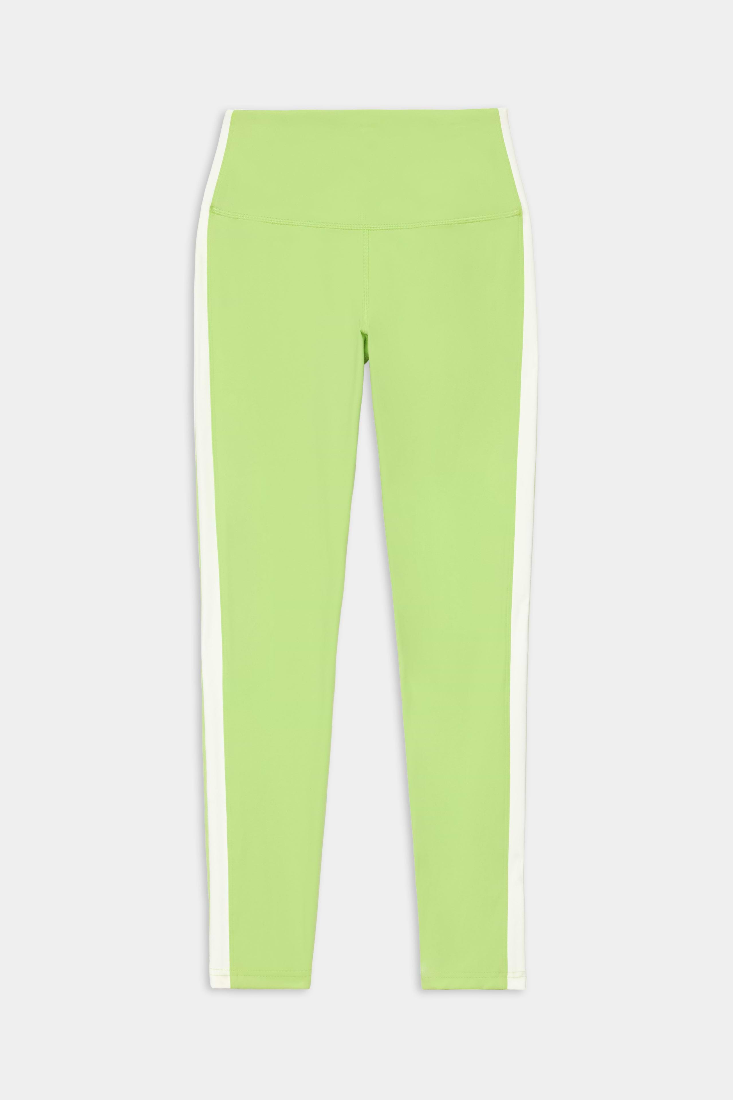 The Clare High Waist Rigor 7/8 leggings by SPLITS59, in Limeade/White, feature a high-rise fit and performance Rigor fabric with crisp white vertical stripes along both outer sides—ideal for gym workouts. Shown on a plain white background.
