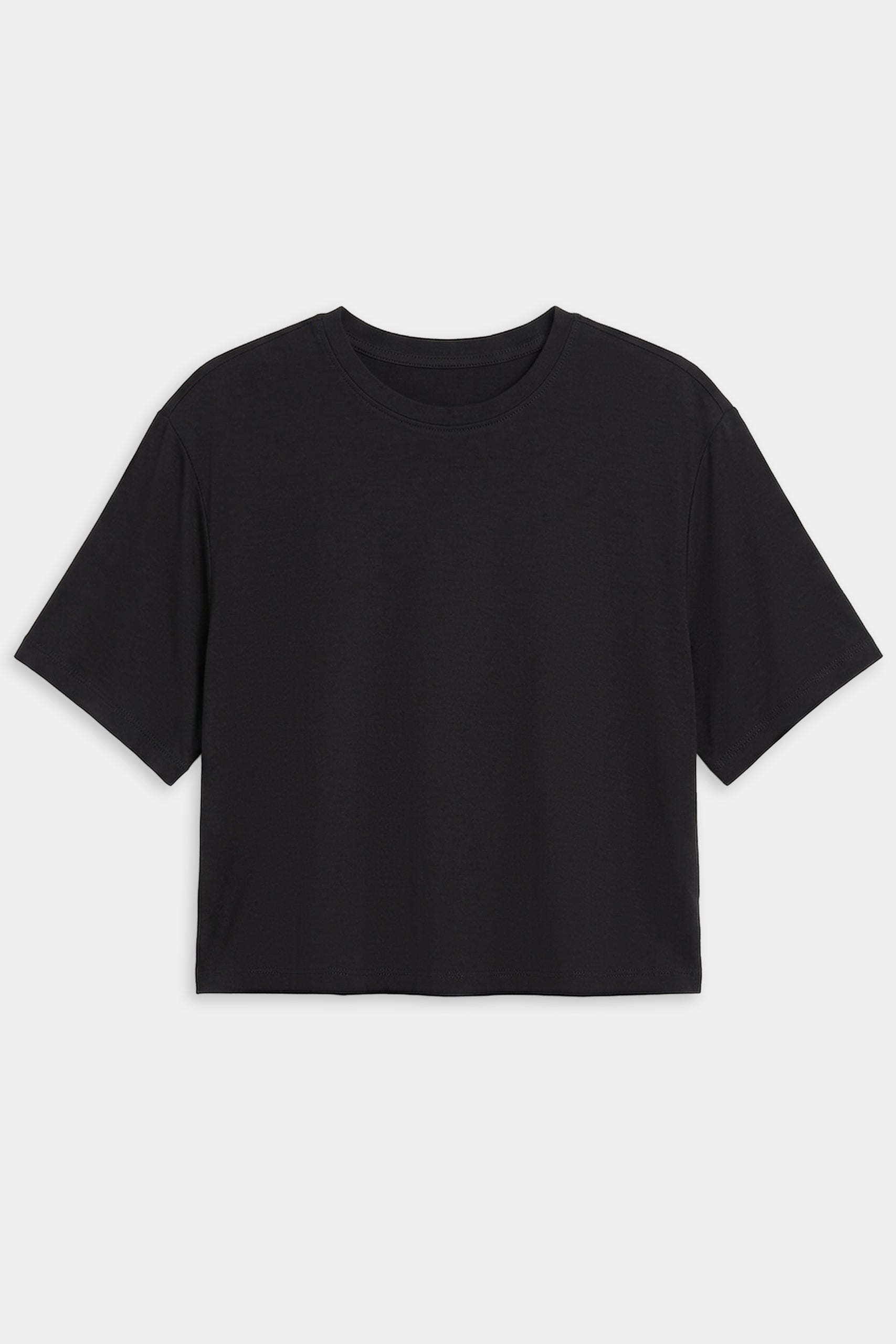 The SPLITS59 Djuna Oversized Jersey Tee in black is a versatile cropped short-sleeve shirt, ideal for gym workouts, shown laid flat on a white background.