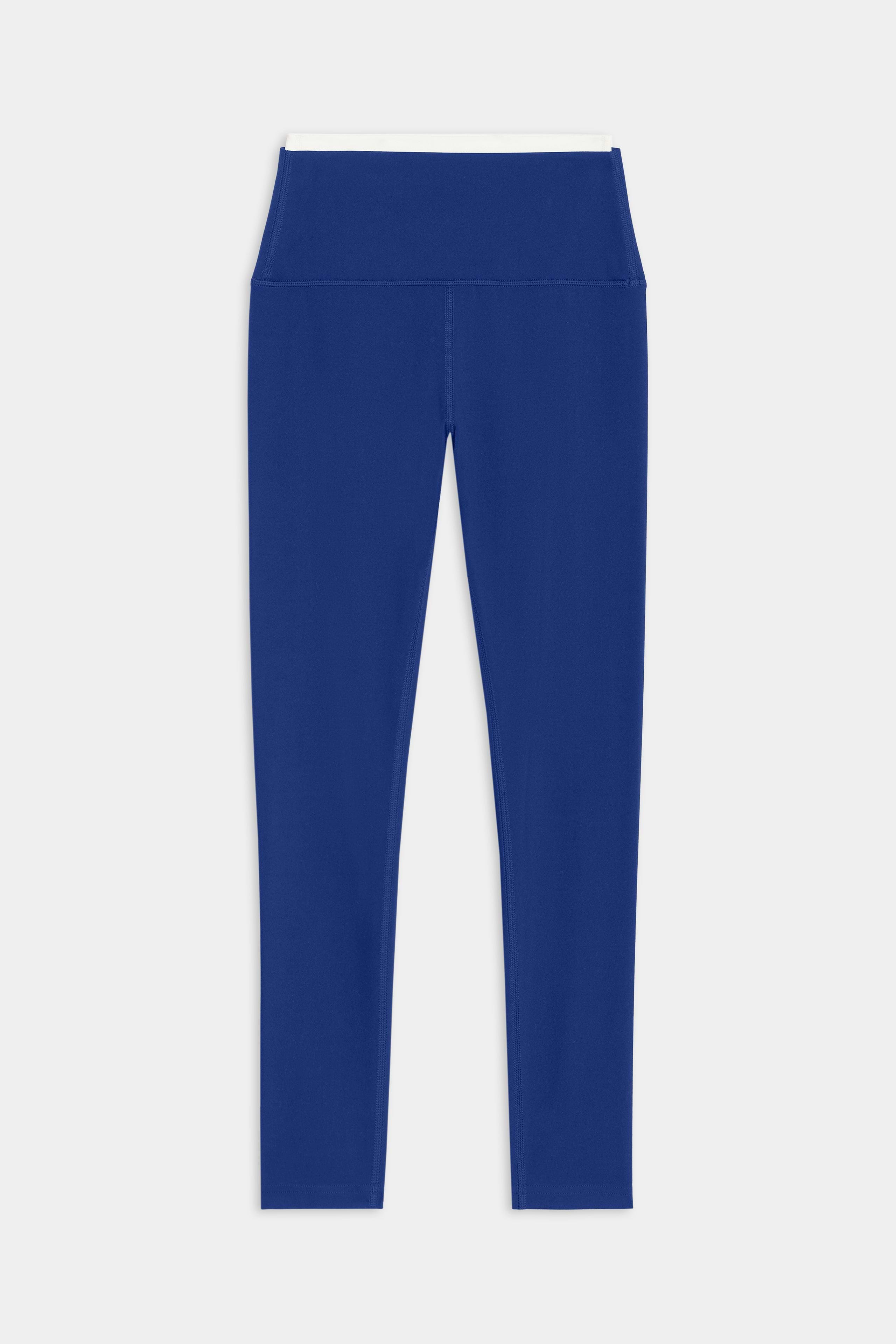 SPLITS59 Dual High Waist Airweight 7/8 Legging in cobalt with a white waistband features a high-waisted design, ideal for hot yoga. Displayed on a white background.