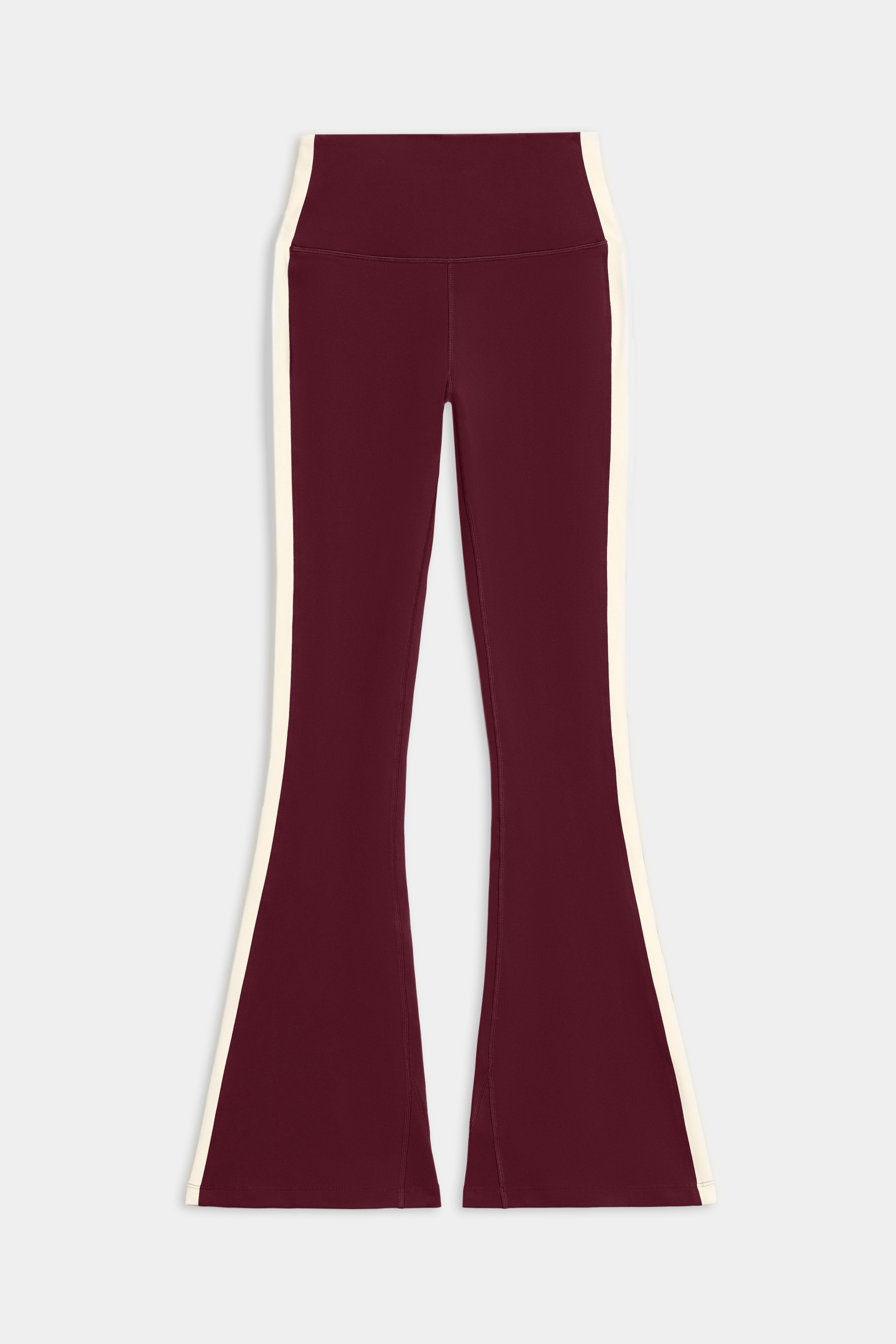 The SPLITS59 Raquel High Waist Flared Legging in Dark Cherry/Creme, made from 4-way stretch supplex, is shown laid flat on a white background.
