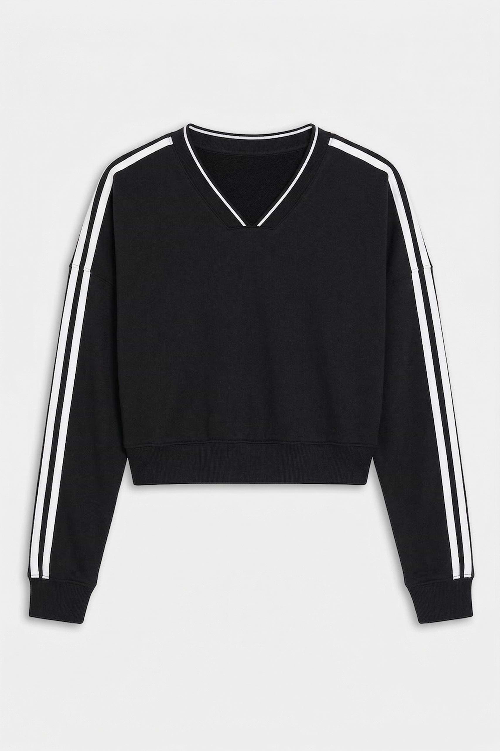 The SPLITS59 Ellie Fleece V Neck Sweatshirt in Black/White features long sleeves with white stripes, a cropped cut, and soft modal-spandex fabric, shown on a white background.