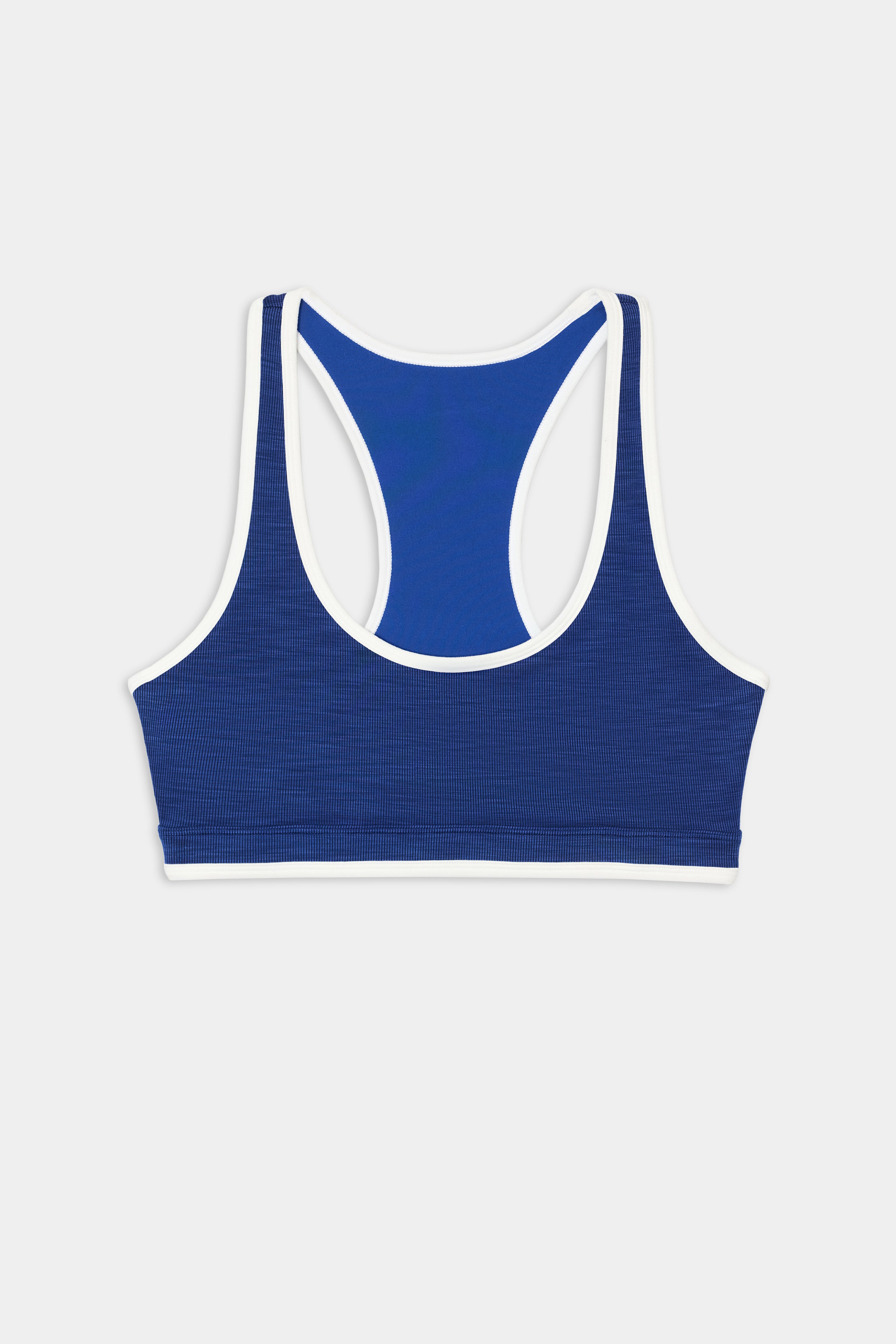 Hayley Active Rib Bra - Heather Cobalt/White by SPLITS59 shown back-up, featuring blue ribbed fabric with white trim, made from a stretchy polyester-spandex blend.