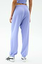 Shown from the back against a plain background, a person wears the SPLITS59 Andie Oversized Fleece Sweatpant in Purple Haze—an ideal, stylish choice for warm weather workouts.