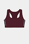 The SPLITS59 Lexi Rigor Bra in Dark Cherry/Black features a maroon racerback design with black and white trim along the sides, crafted from soft nylon spandex fabric and showcased against a white background.