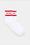 The SPLITS59 Logo Stripe Ankle Socks With Grip are white ankle socks with two red stripes and "SPLITS59" in red near the cuff, plus a textured grip pattern on the soles.