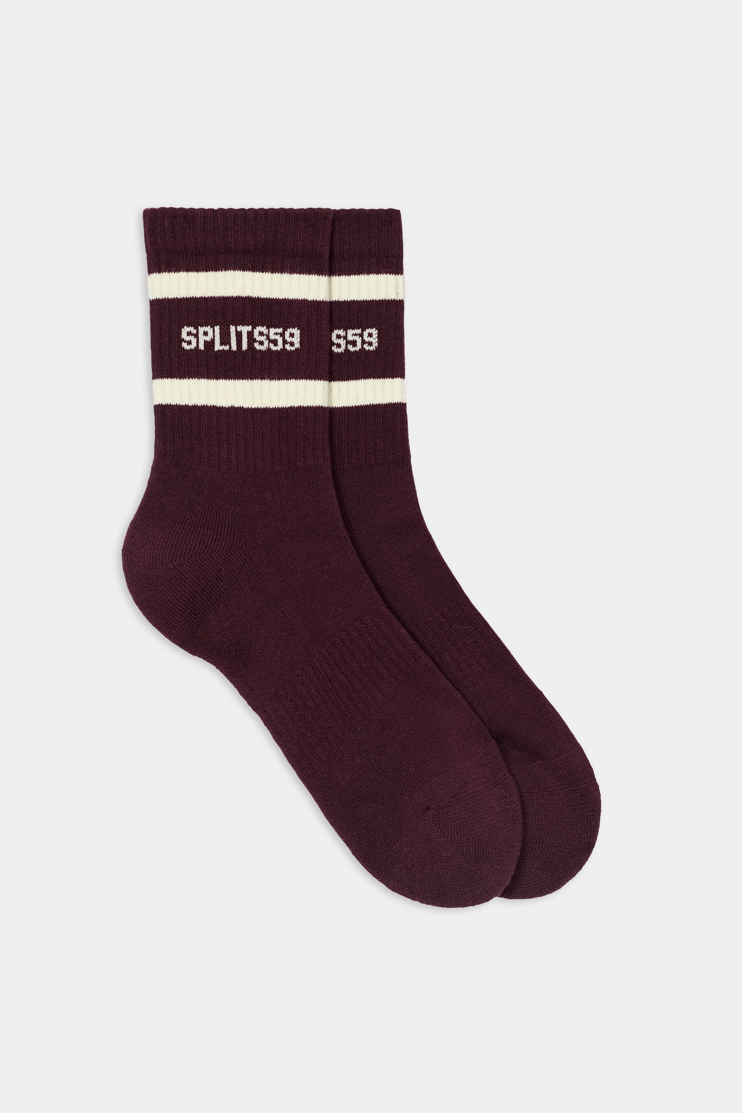 A pair of SPLITS59 Logo Stripe Quarter Socks in Dark Cherry/Creme, featuring white stripes and “SPLITS59” text on the cuffs, crafted from a comfortable premium cotton blend and displayed on a white background.