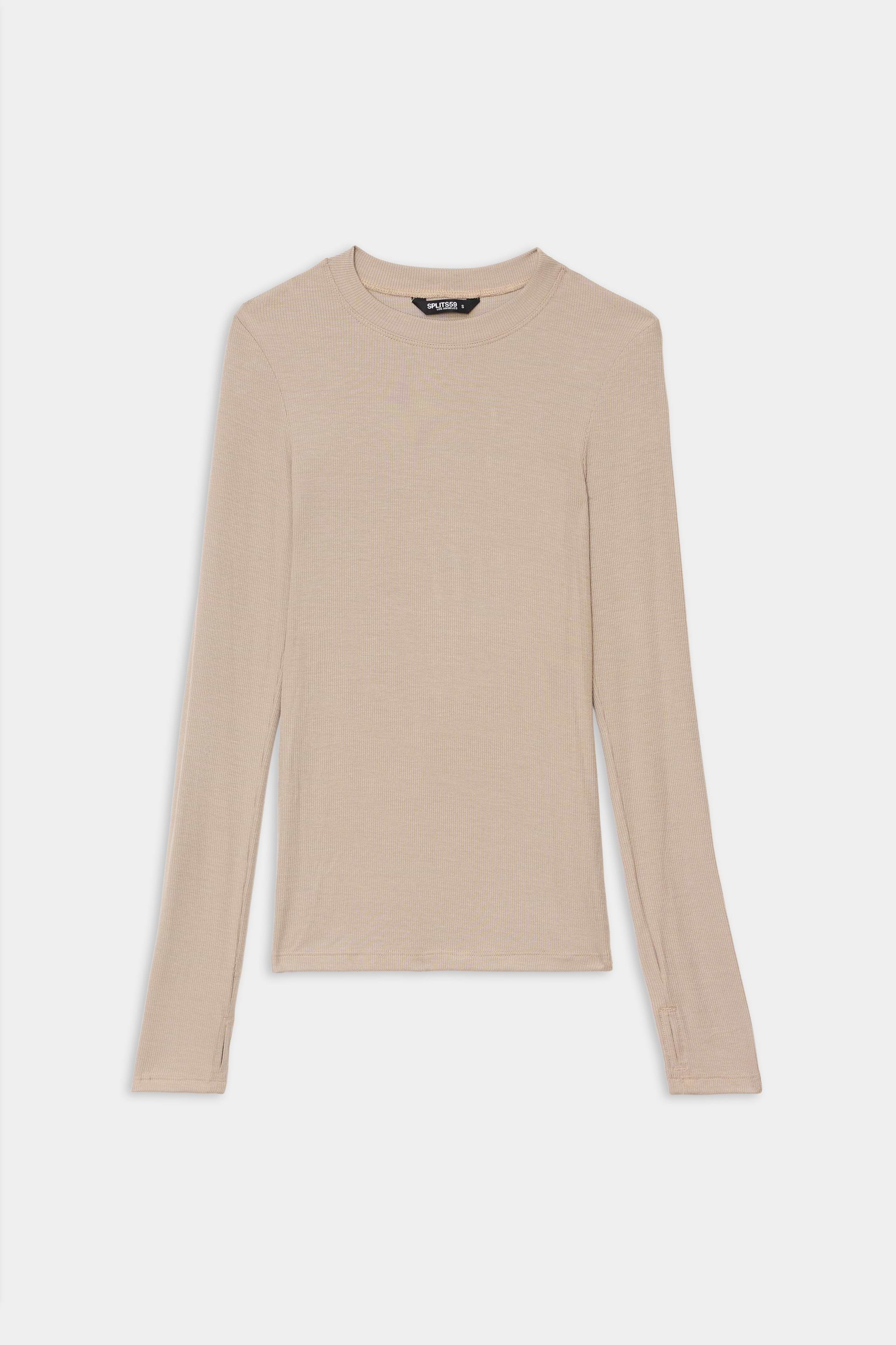 The SPLITS59 Louise Rib Long Sleeve in Latte is laid flat on a white background, ideal for gym workouts and everyday wear. Made in Los Angeles.