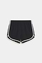 The SPLITS59 Megan Woven Nylon Run Short in Black/Creme features white trim, an elastic waistband, and curved hems in a nylon-spandex blend, shown laid flat on a white background.