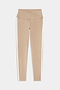 The SPLITS59 Mia Rigor Legging w/ Stripe in Latte/White features a high-waisted crisscross waistband, nylon blend fabric, and white vertical side stripes, shown laid flat on a white background.