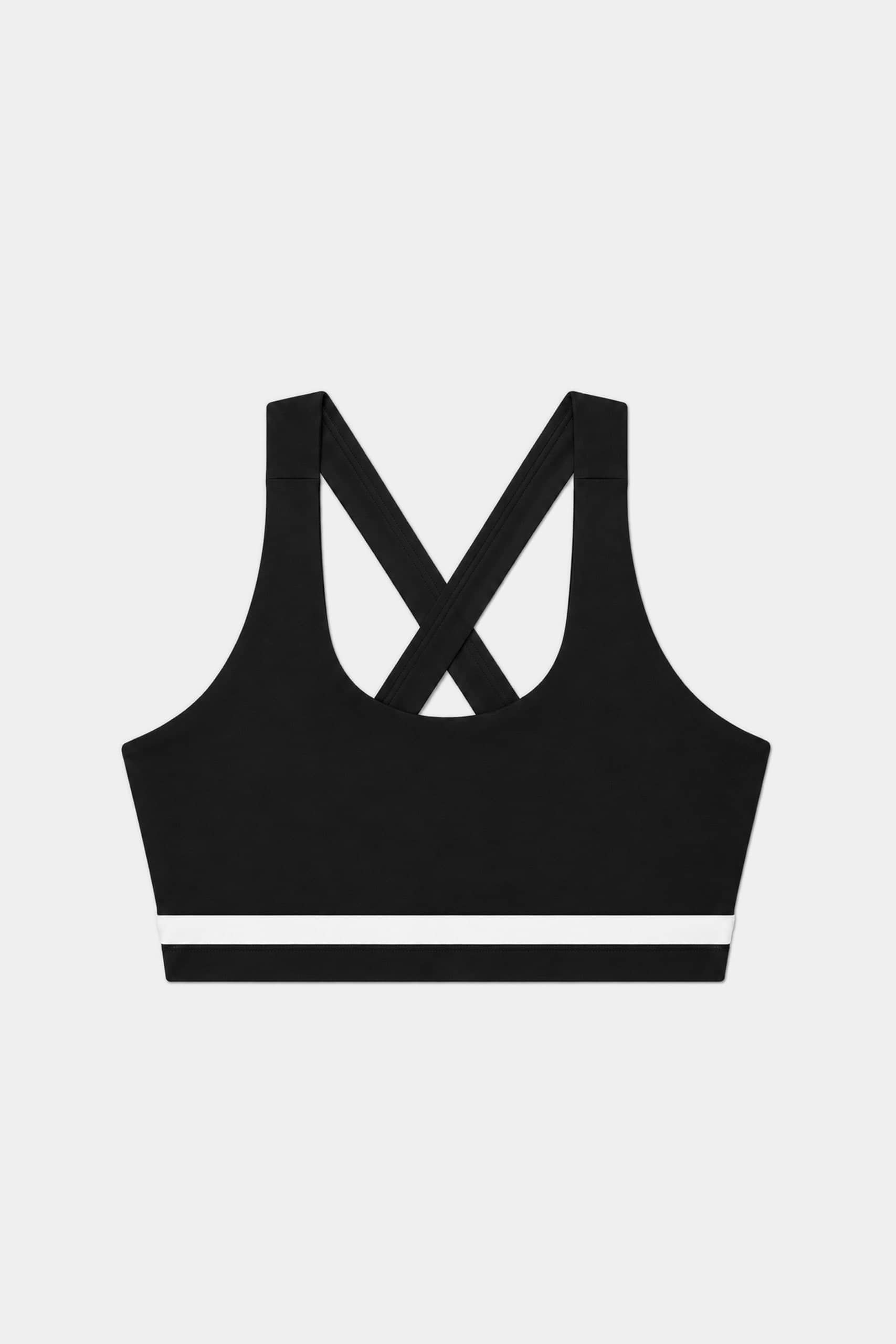 The SPLITS59 Miles Rigor Bra - Black/White features a white horizontal stripe near the hem and distinctive crisscross back straps, shown on a plain white background—ideal for your next workout.