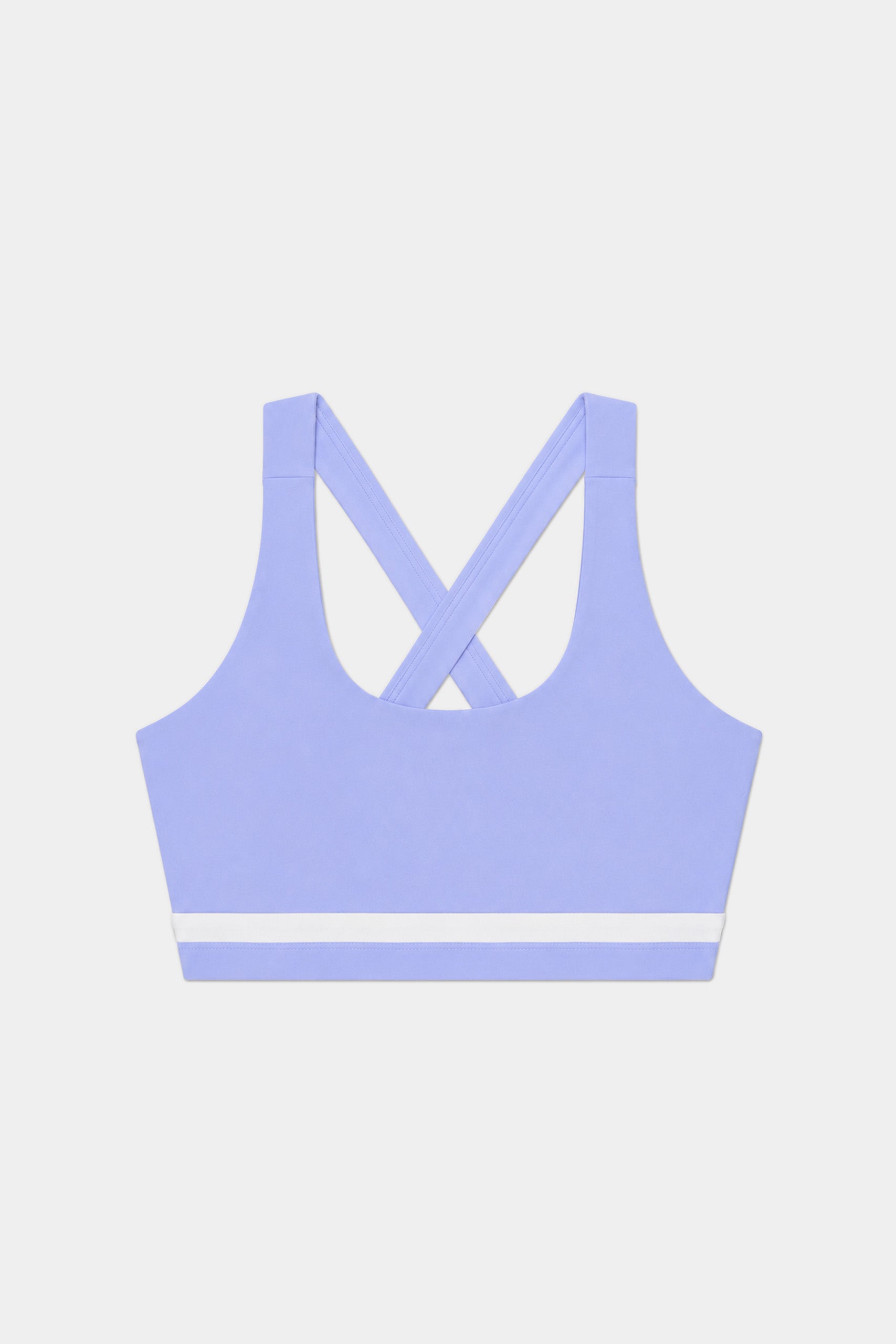 The SPLITS59 Miles Rigor Bra in Purple Haze/White features a supportive racerback design with a white horizontal stripe near the bottom, shown on a plain white background.