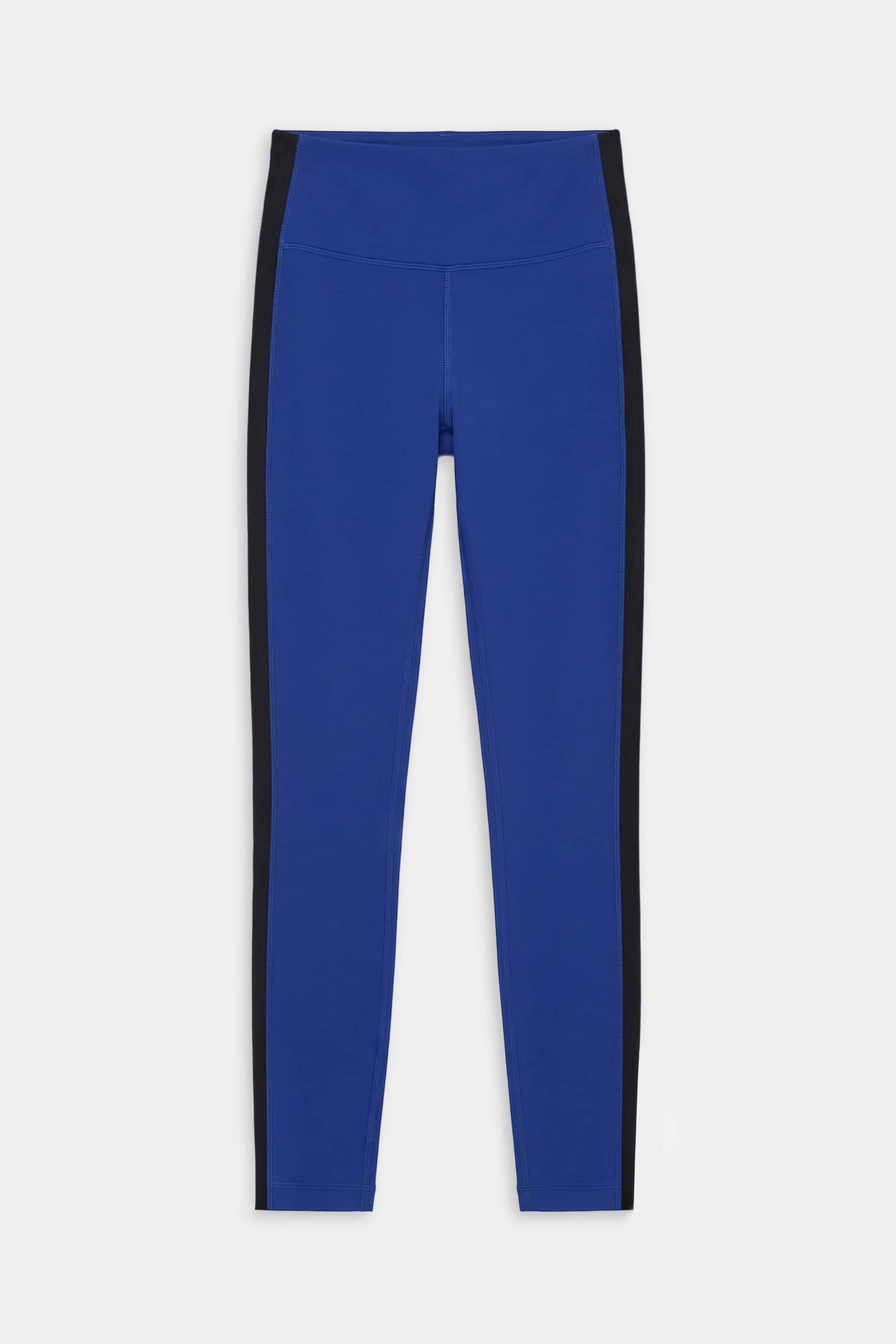 The SPLITS59 Clare High Waist Rigor 7/8 leggings in cobalt with black side panels, made from Rigor fabric, are shown flat on a white background—ideal for gym workouts.