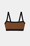The SPLITS59 Monah Rigor Bra - Toffee/Black features black trim and straps, made from a nylon-spandex blend, shown flat on a white background.