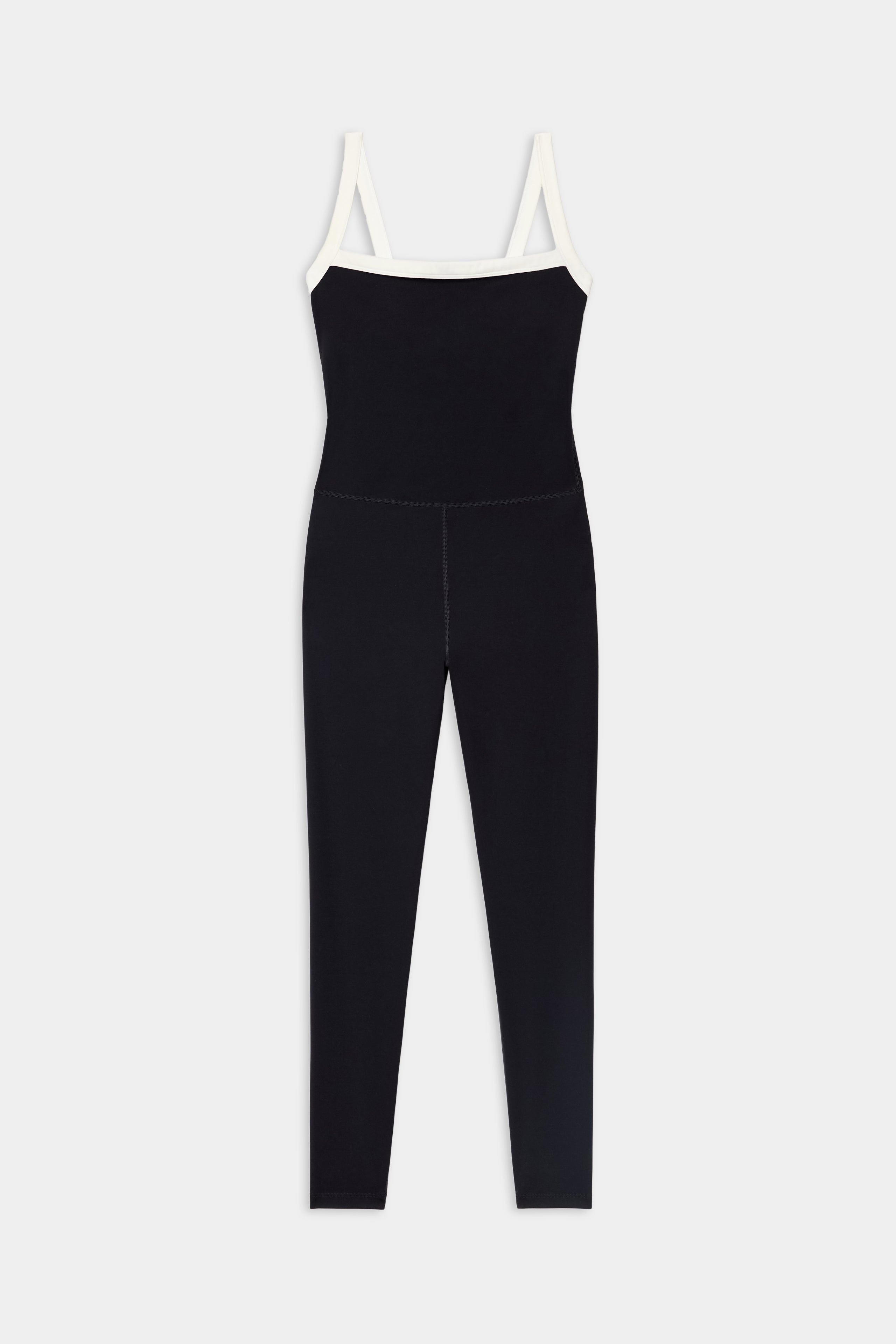 The Monah Rigor Jumpsuit 7/8 - Black/White by SPLITS59 is a black sleeveless jumpsuit with white straps, fitted stretch silhouette, and 7/8 length legs, shown on a white background.