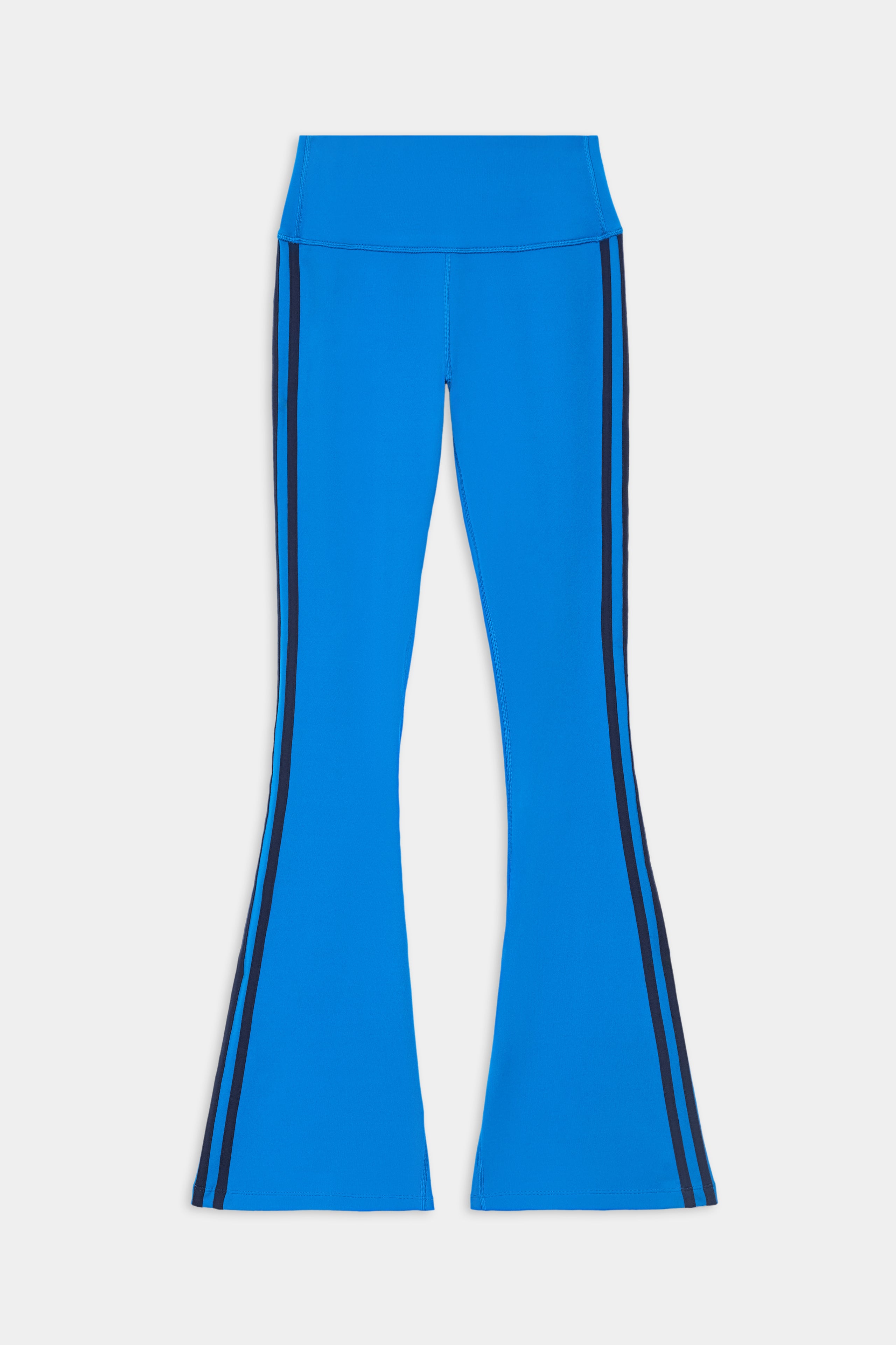 Raquel High Waist Supplex Flare pants by SPLITS59 in Classic Blue/Indigo, featuring a high waist and black vertical side stripes, displayed flat on a white background.