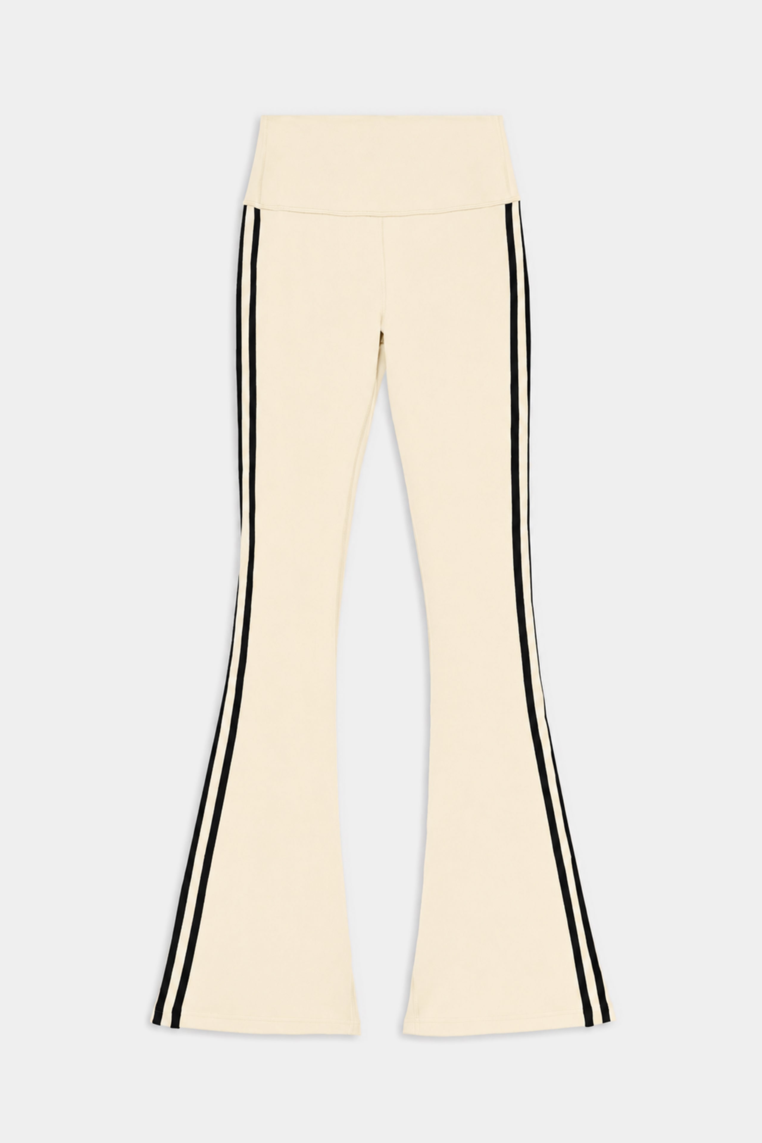 The SPLITS59 Raquel High Waist Supplex Flare - Creme/Black pants feature a cream color with black side stripes, a high waistband inspired by high waist leggings, and full-length flared legs. Crafted with comfortable 4-way stretch fabric, they are shown laid flat on a plain background.