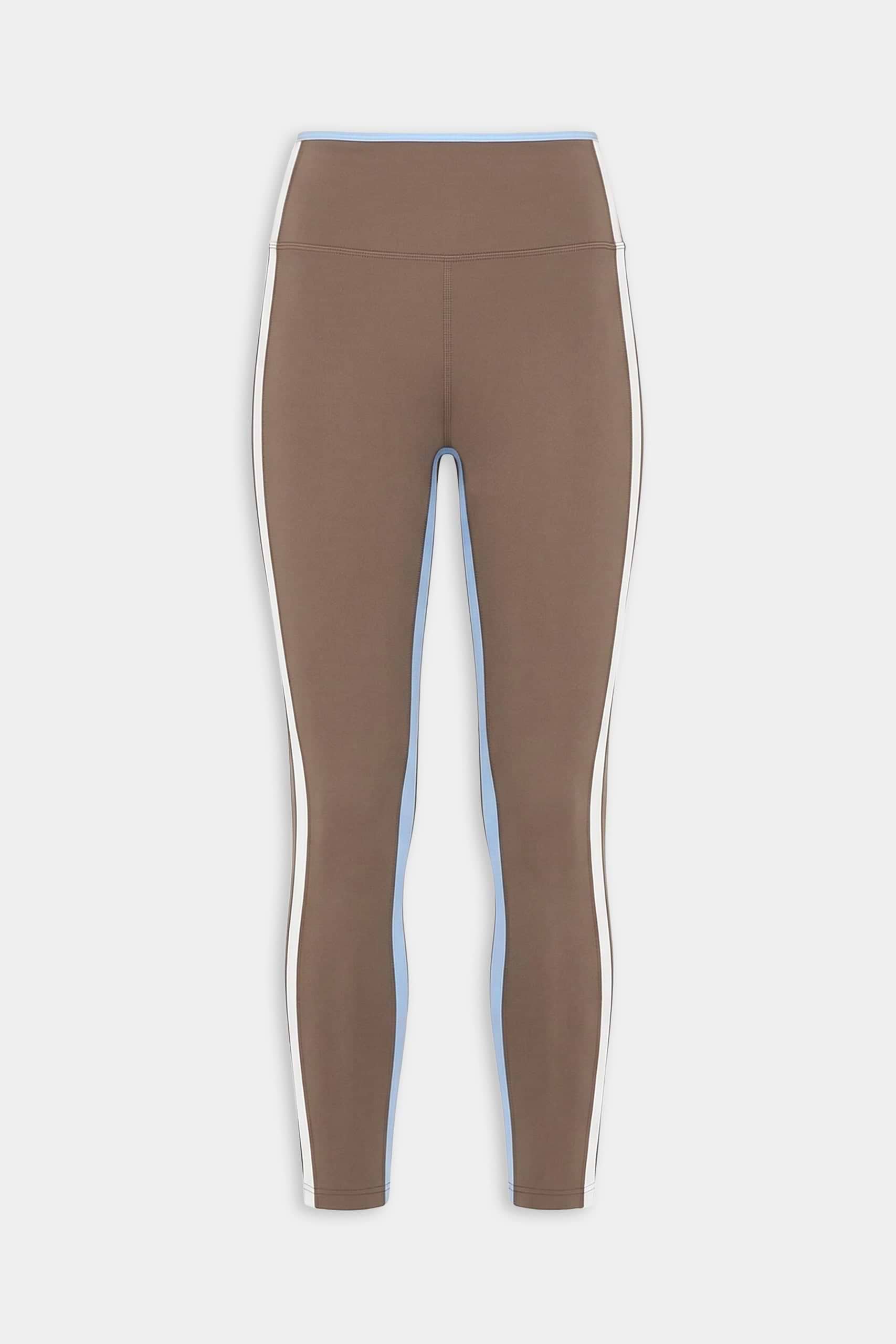 The SPLITS59 Sam High Waist Rigor 7/8 leggings in Lentil/White feature a compressive fit with white and light blue side panels, displayed on a plain white background.