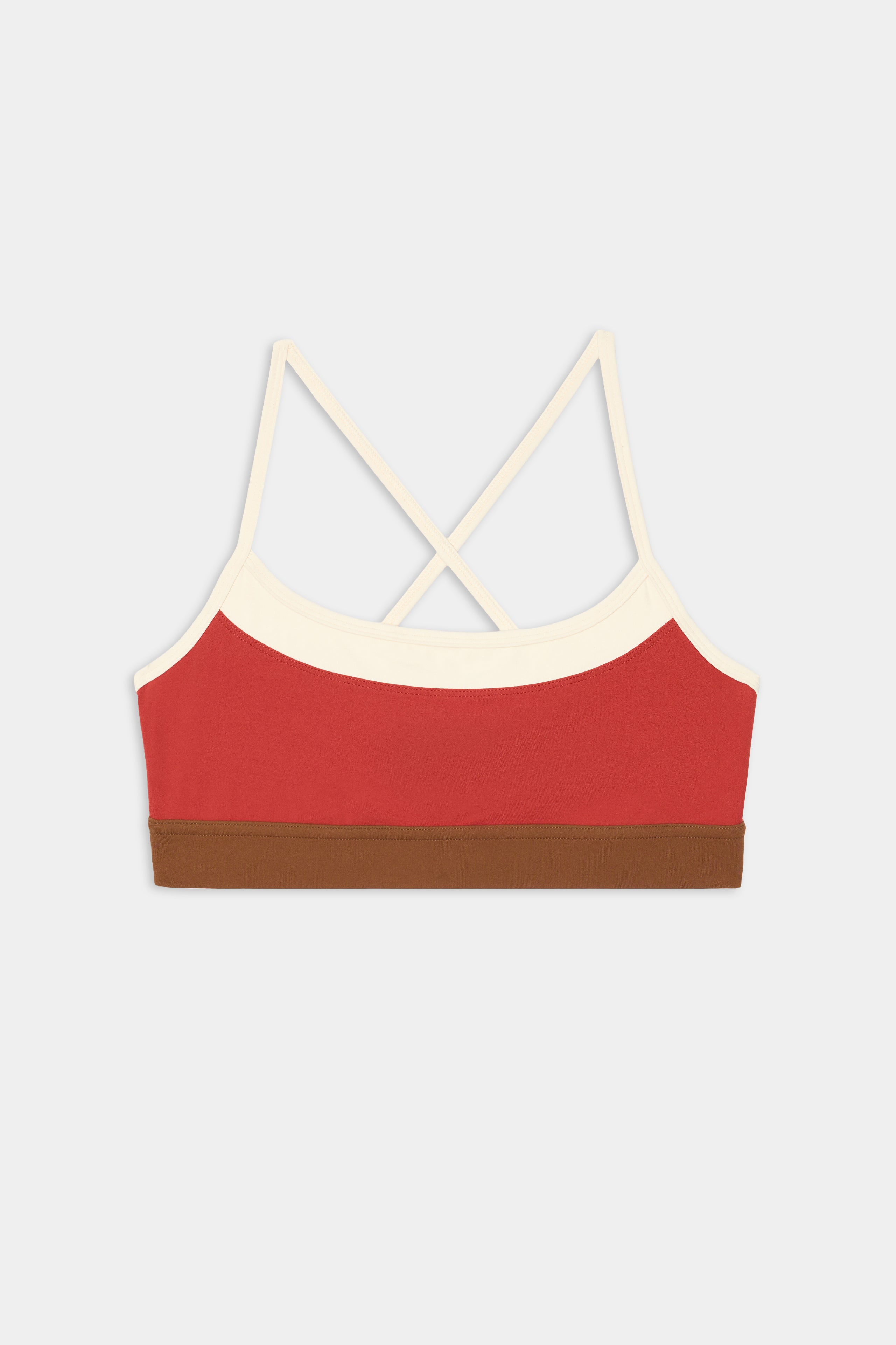 The Scottie Airweight Bra - Terracotta/Creme by SPLITS59 features cream straps, a brown band, and cross-back design in spandex and nylon on a plain white background.