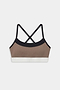 The SPLITS59 Scottie Airweight Bra in Lentil/Black is a colorblock sports bra with black straps, a tan front panel, black trim, and a white bottom band, made from spandex and nylon. Displayed on a white background.