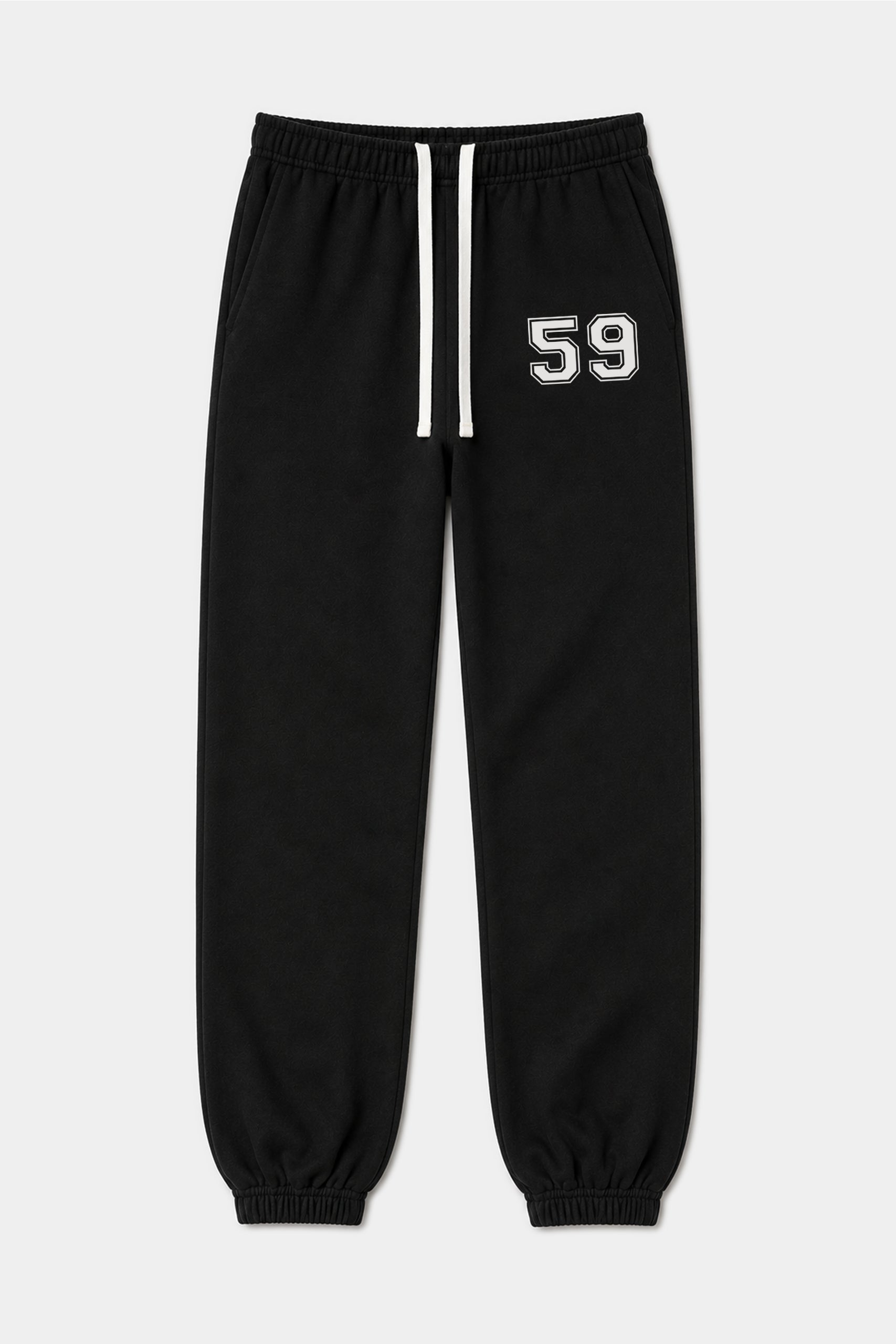 The SPLITS59 Serena French Terry Oversized Sweatpant in Black/59 features an elastic waistband with a white drawstring, elastic cuffs, and the number 59 printed in white on the left thigh. This oversized sweatpant is displayed laid flat against a plain background.