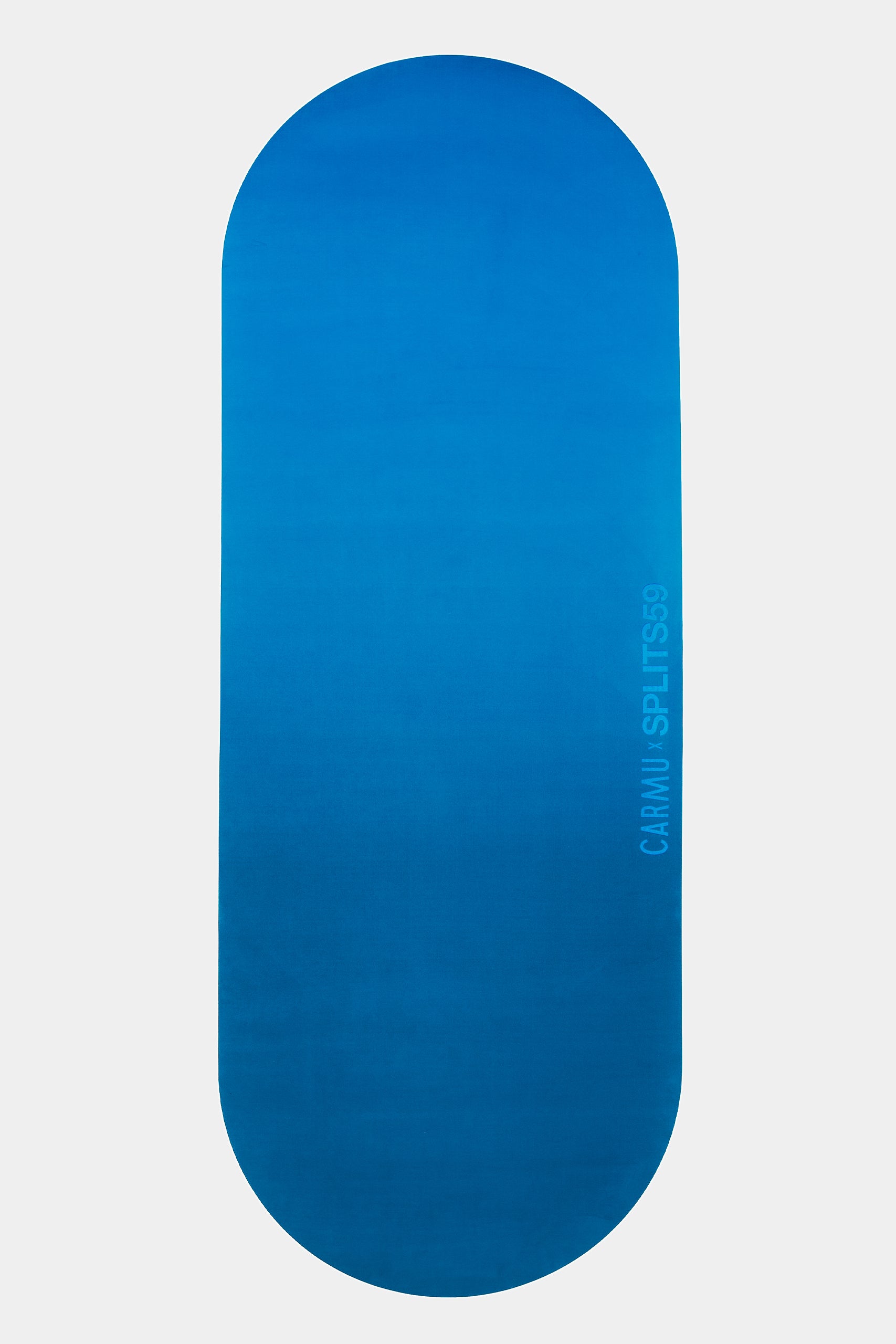 A blue oval eco-rubber yoga mat called The Skye Mat by SPLITS59, featuring the brand’s logo printed on one end, displayed on a plain light background.
