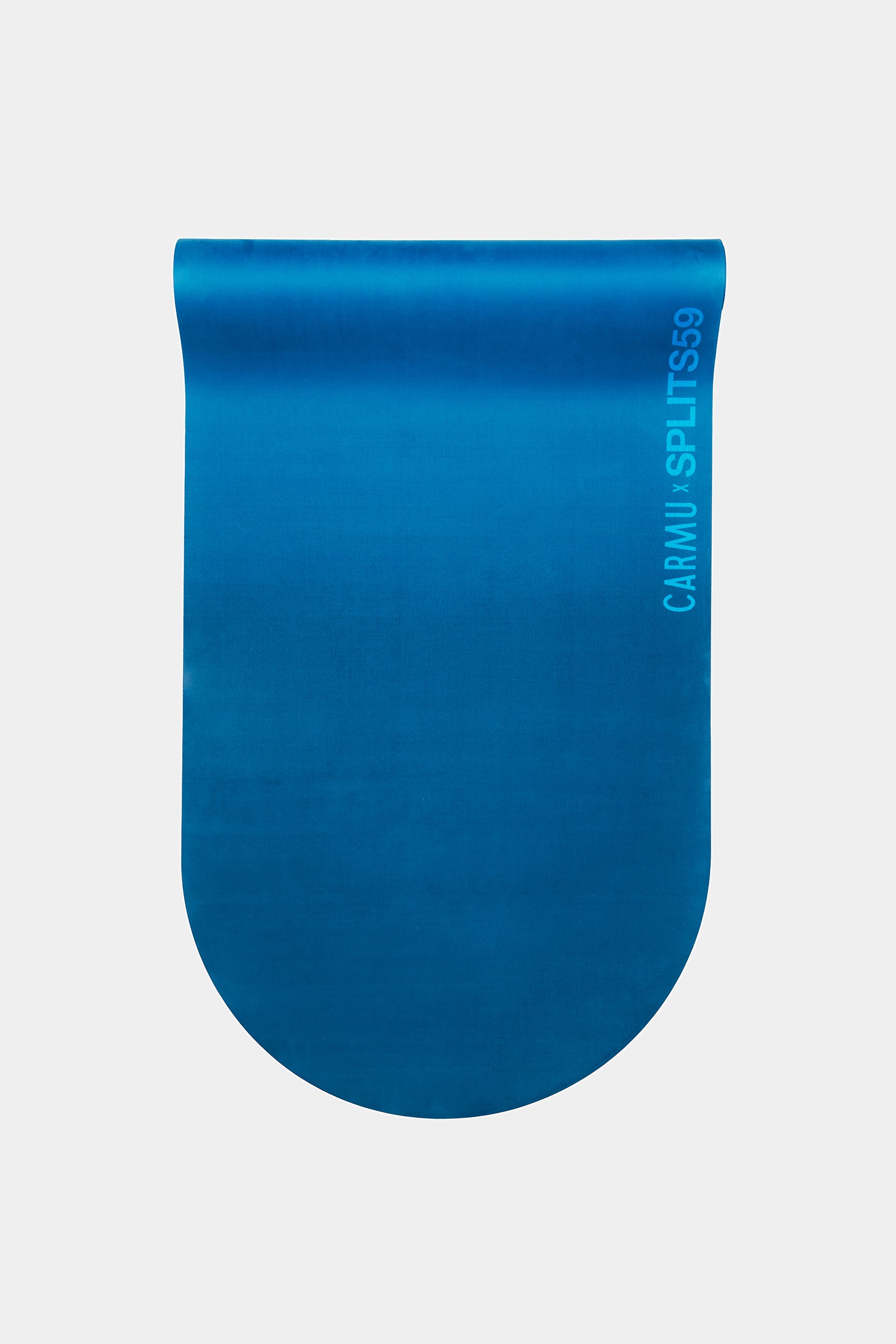 A blue eco-rubber yoga mat called The Skye Mat by SPLITS59, featuring rounded corners at the bottom and “SPLITS59” printed vertically on the right side.