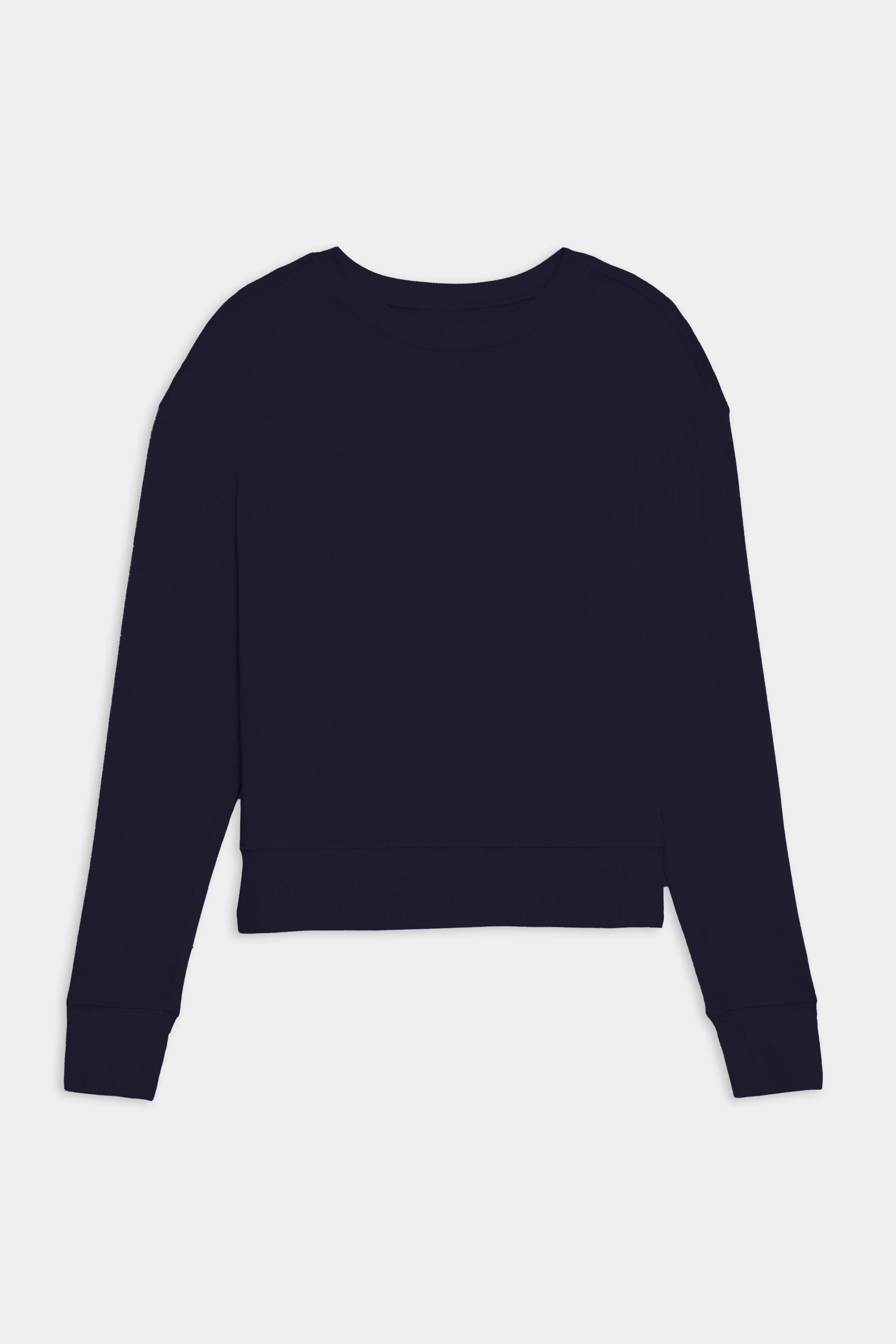 The SPLITS59 Sonja Fleece Sweatshirt in indigo, a long-sleeve crewneck pullover crafted from ultra luxe fleece, is shown laid flat from the back on a white background. MADE IN LOS ANGELES.