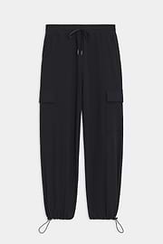 The Nico Airweight Cargo Pant by SPLITS59, in black, features a relaxed fit with side pockets and elastic cuffs. Made of lightweight Airweight fabric, these pants offer ultimate comfort and style for everyday wear, displayed flat on a white background.