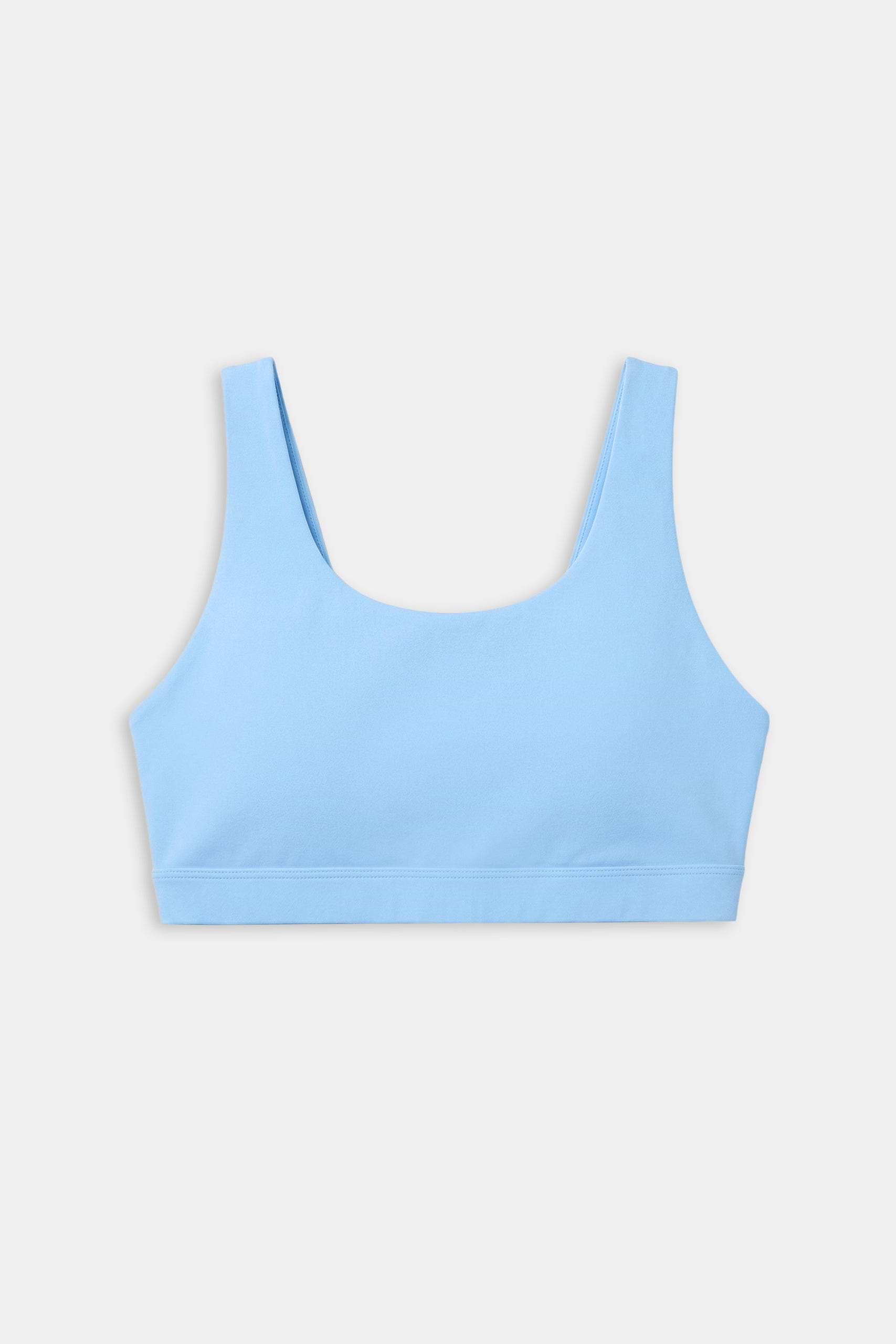 The SPLITS59 Sprint Rigor Bra in Skylight features a scoop neckline and wide straps, ideal for gym workouts and multi-sport performance, shown against a plain white background.