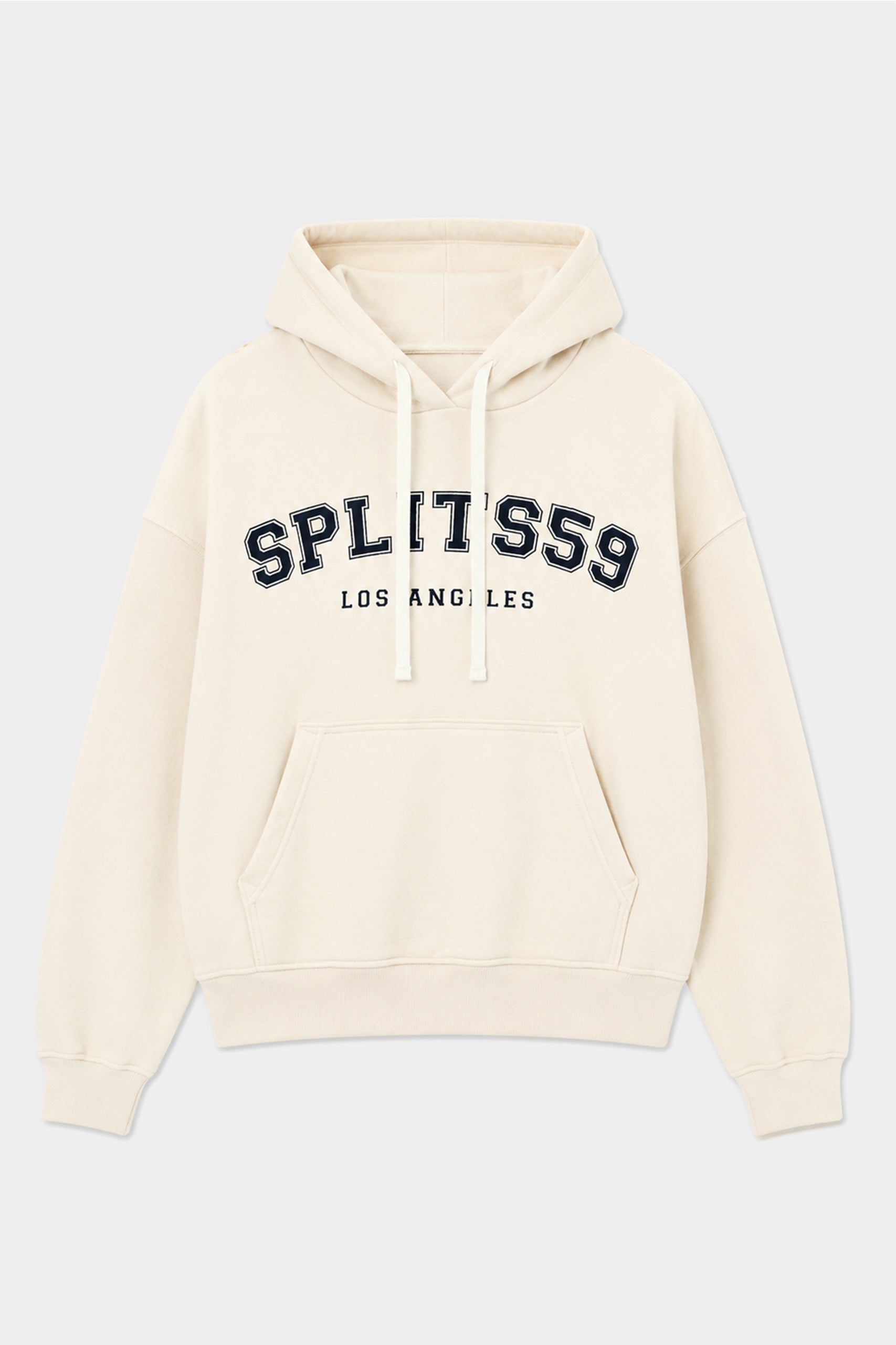 The Stella French Terry Oversized Hoodie in Creme by SPLITS59 is crafted from 100% cotton and features “SPLITS59 LOS ANGELES” printed in black and white lettering on the front, along with a front pocket and adjustable drawstrings.
