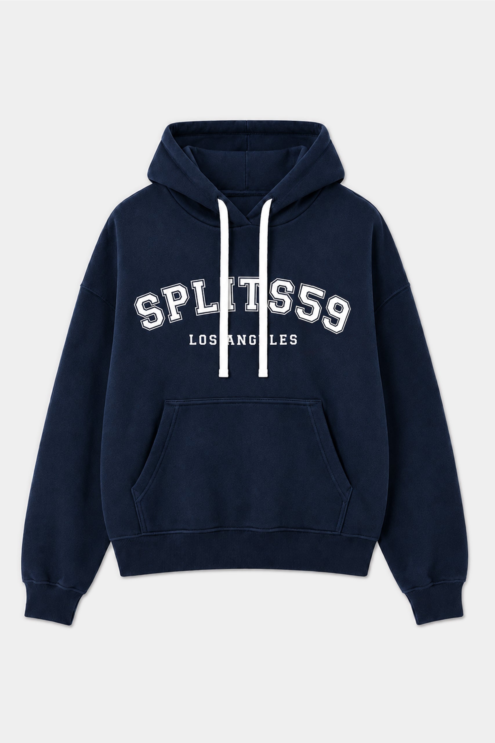 The Stella French Terry Oversized Hoodie by SPLITS59 features an indigo color, is crafted from 100% cotton, and includes white drawstrings, a kangaroo pocket, and “SPLITS59 LOS ANGELES” printed in white on the front.