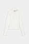 The SPLITS59 Stevie Active Rib Half Zip Waist Length in white is a long-sleeve, high-neck top with a half-zip front, waist-length fit, and rib texture—ideal for gym workouts.