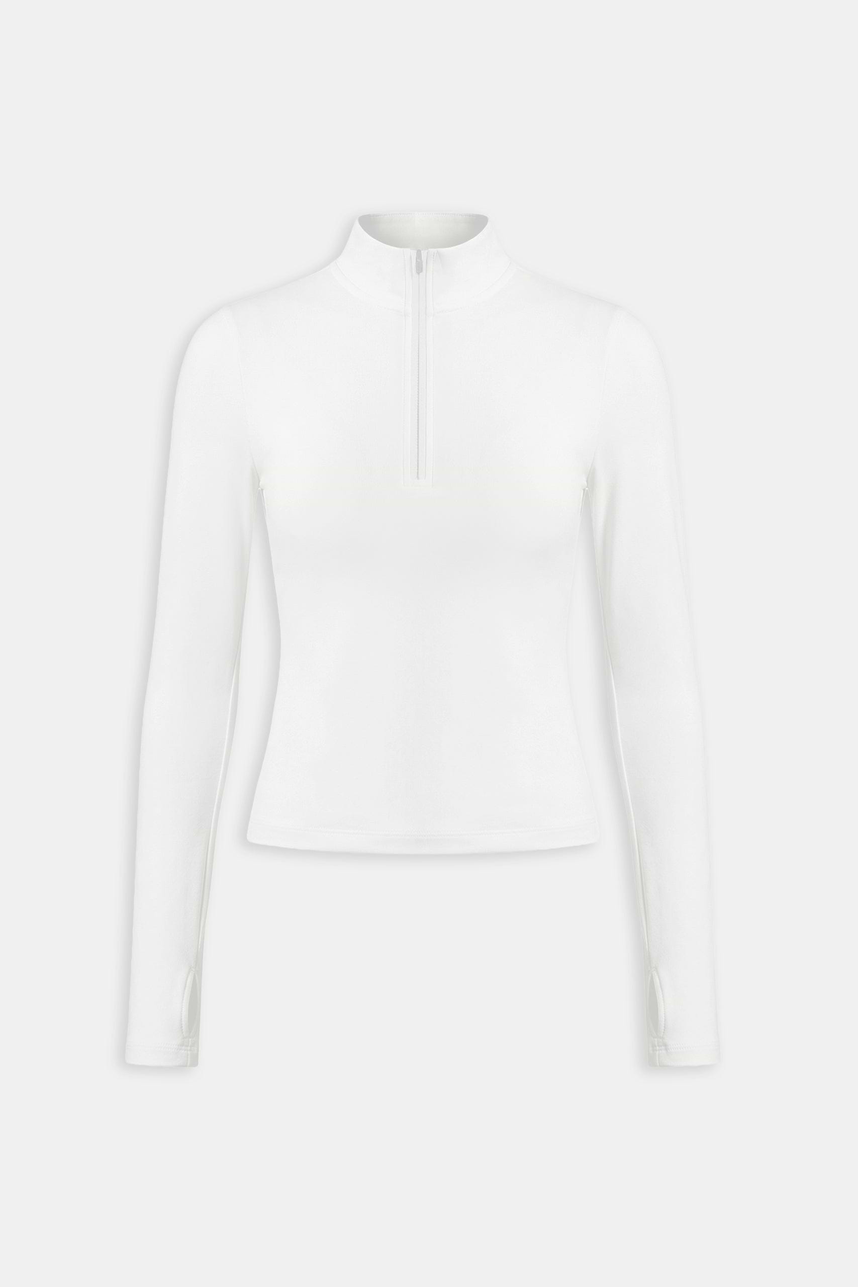 The SPLITS59 Tess Rigor Half Zip Waist Length in white is a soft nylon spandex, long-sleeve mock-neck top with a front half-zip closure, shown on a plain white background.