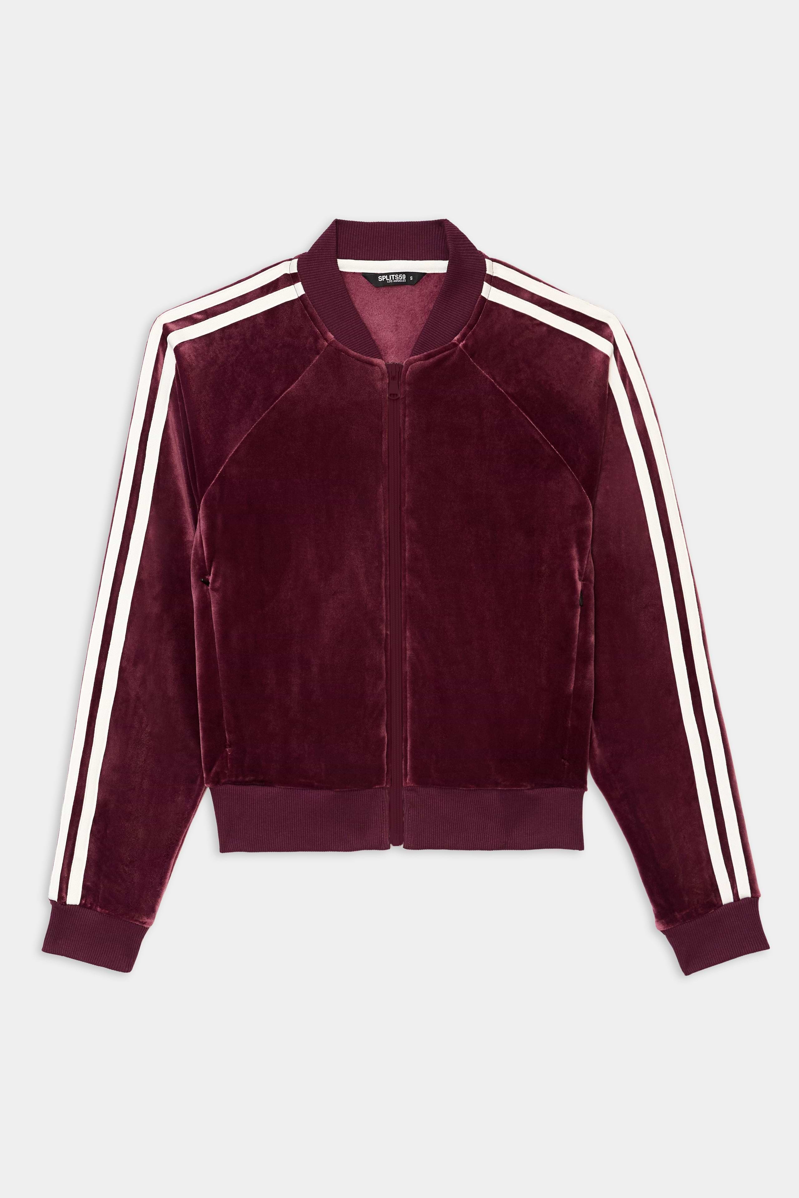 The SPLITS59 Heritage Velour Bomber in Dark Cherry/White features a zip-up design with white double stripes on the sleeves and ribbed collar, cuffs, and hem.