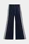 The SPLITS59 Heritage Velour Pant in Indigo/White features wide-leg styling, soft polyester-spandex fabric, and distinctive white double side stripes along the outer seams.
