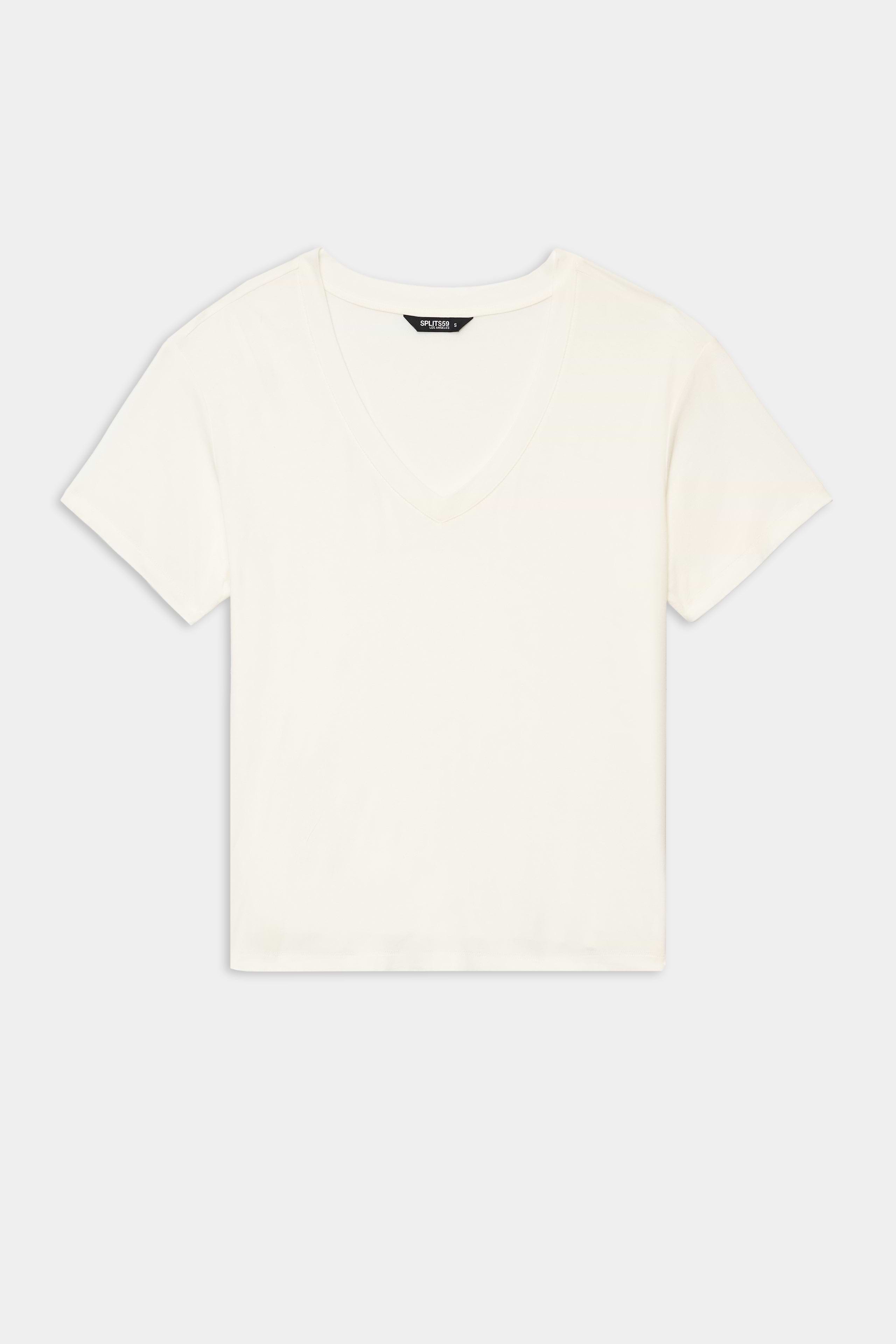 The Georgia Jersey V-Neck - White by SPLITS59, a soft blend short-sleeve crop top, is shown laid flat on a white background.