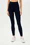 The back view of a woman wearing SPLITS59 Loren Seamless High Waist Full Length leggings in Indigo.