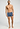 Full-body view of a men model wearing HA tanzanite melange modal/viscose/tencel Pants