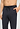Close-up view of a men model wearing HA charcoal melange modal/viscose/tencel Long Pants