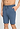 Close-up view of a men model wearing HA tanzanite melange modal/viscose/tencel Short Pants